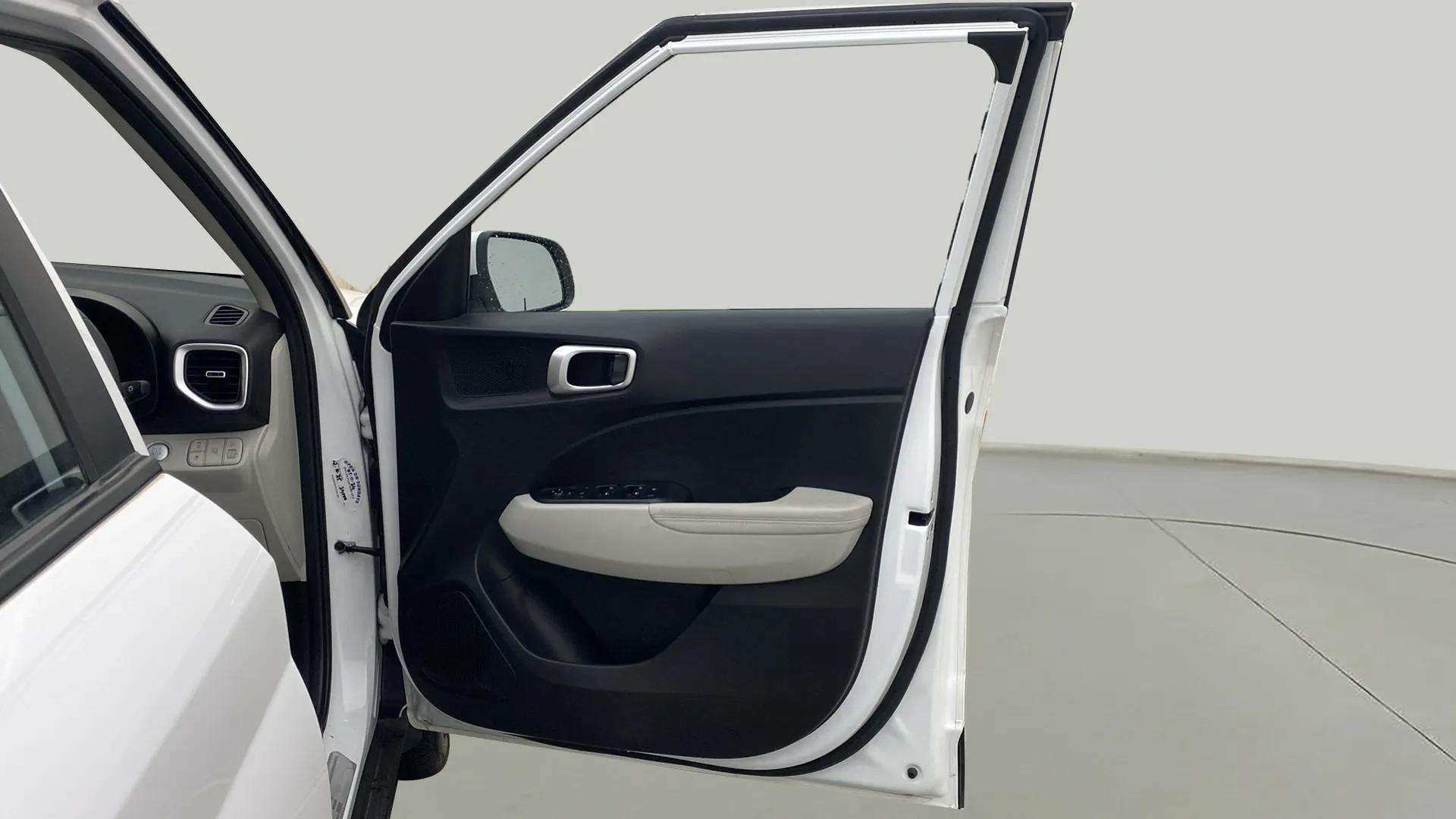 Front driver door interior of a Hyundai Venue