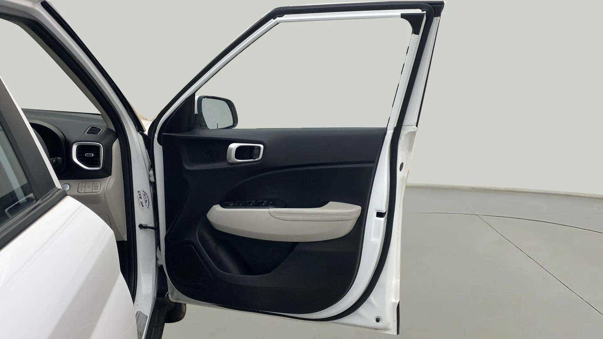 Front driver door interior of a Hyundai Venue