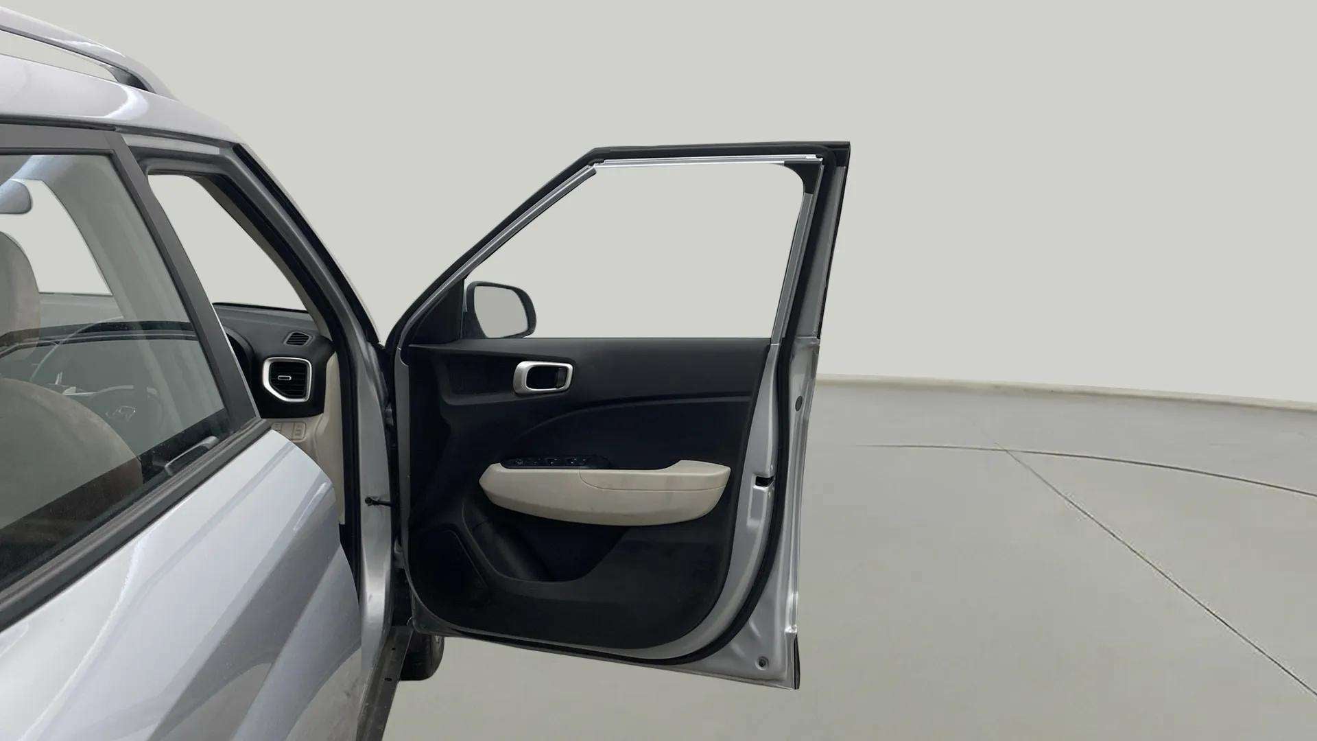 Front door interior view of a Hyundai Venue