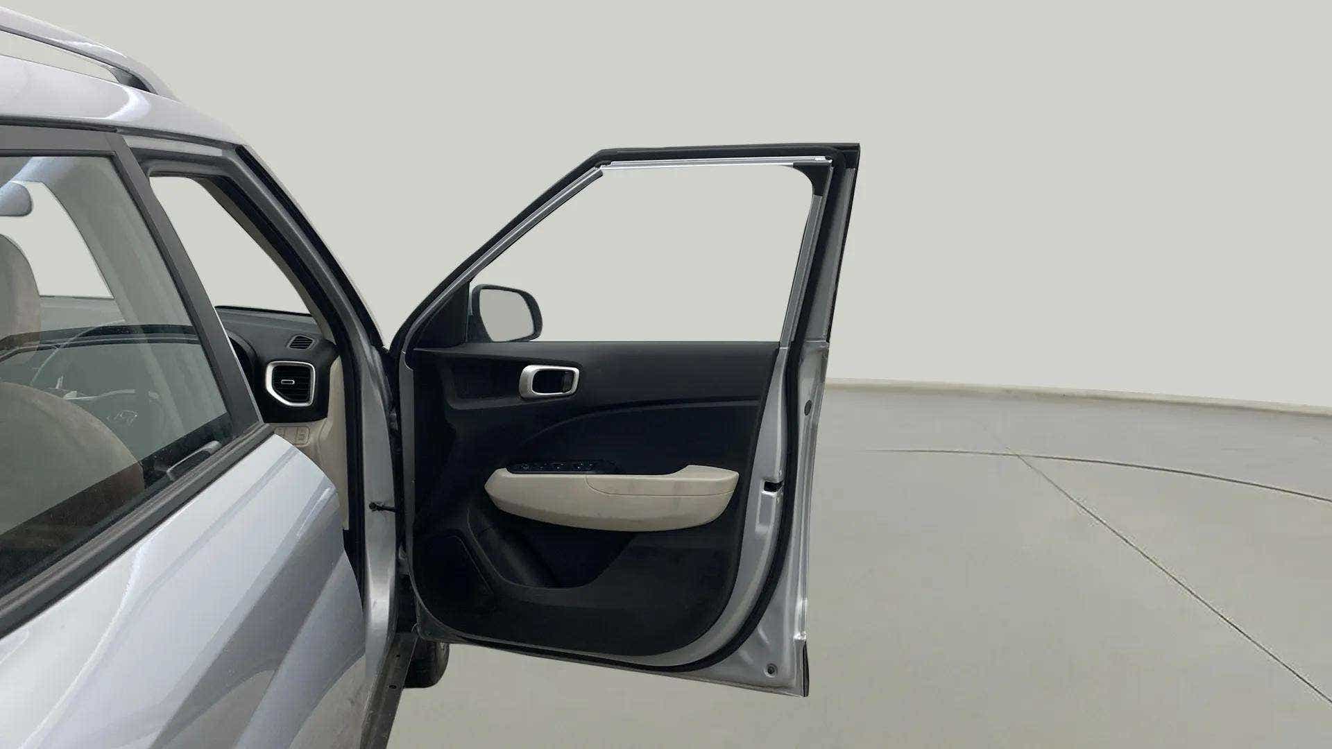Front door interior view of a Hyundai Venue
