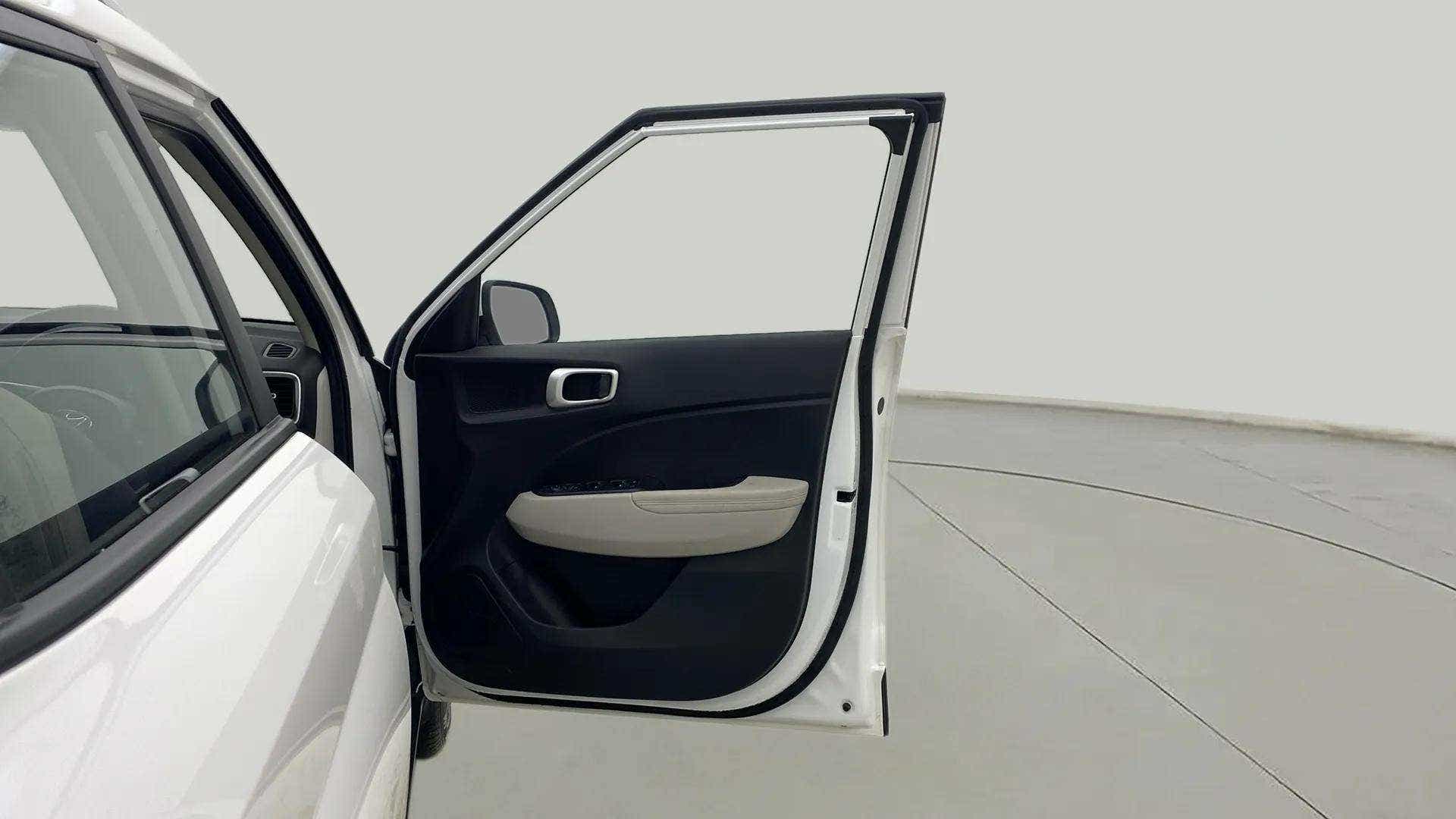 Front door open view of a Hyundai Venue