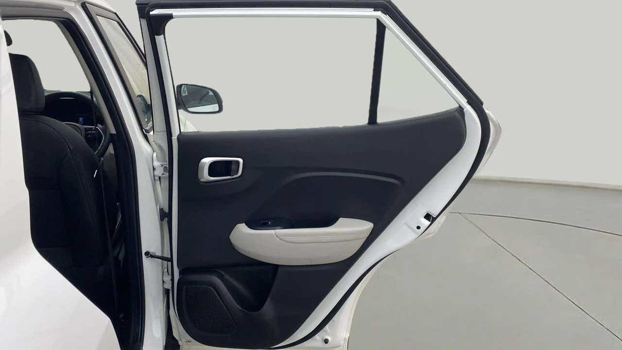 Rear door interior view of a Hyundai Venue