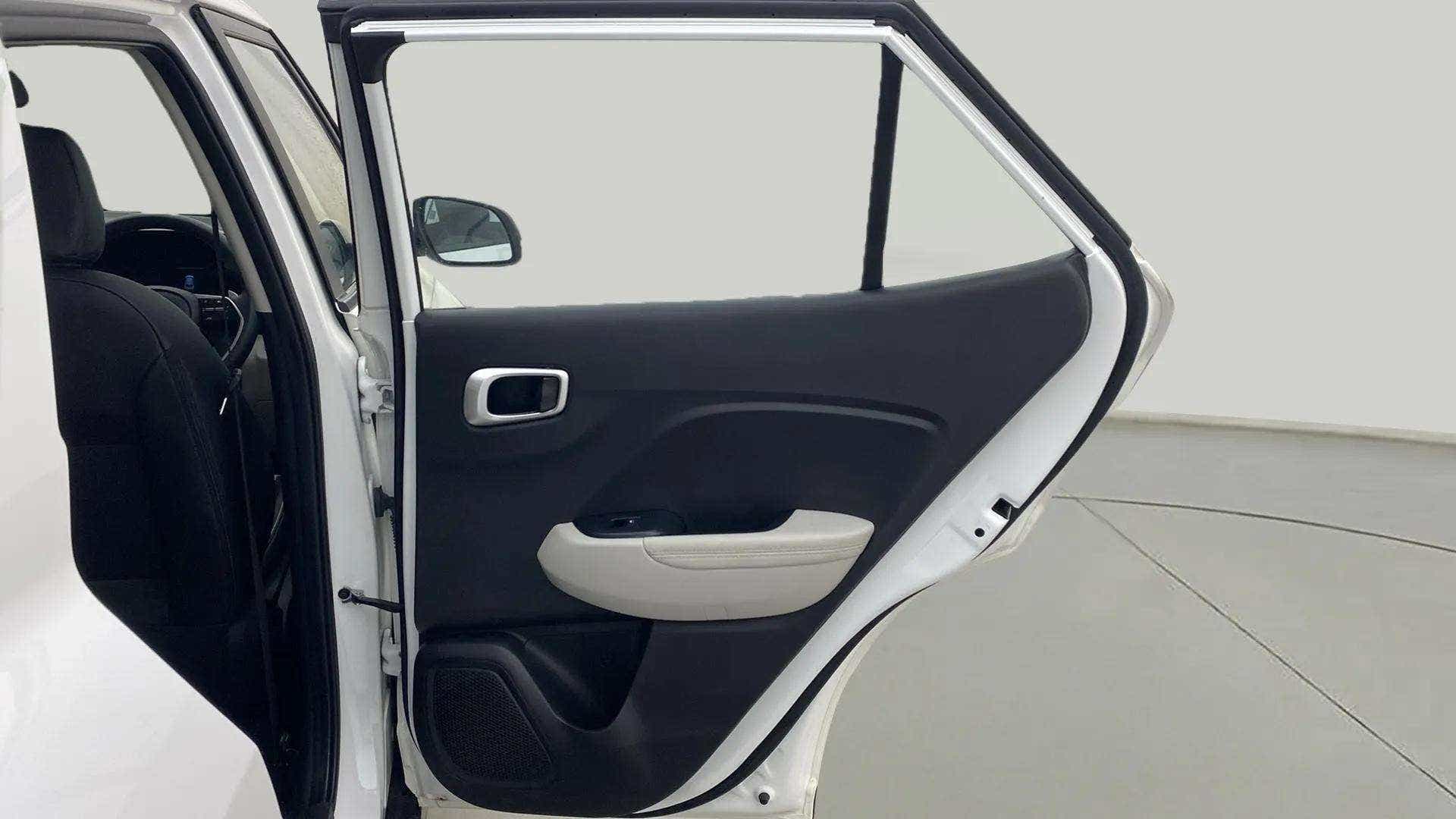 Rear door interior view of a Hyundai Venue