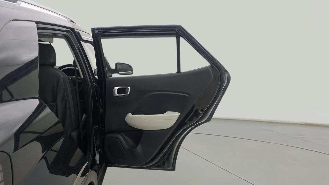 Rear door open view of a Hyundai Venue