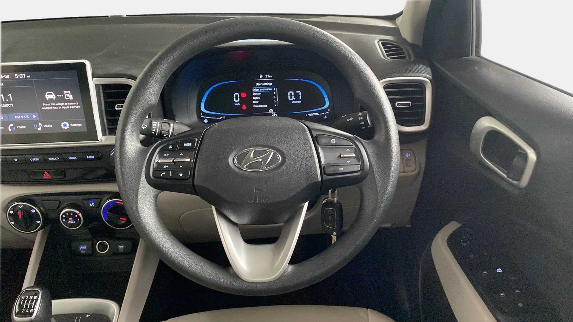 Interior dashboard and steering wheel of a Hyundai Venue