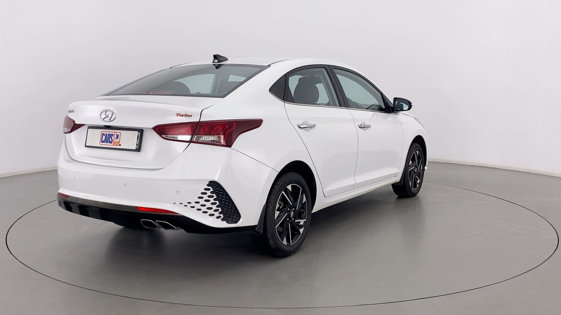 Rear three-quarter view of a Hyundai Verna