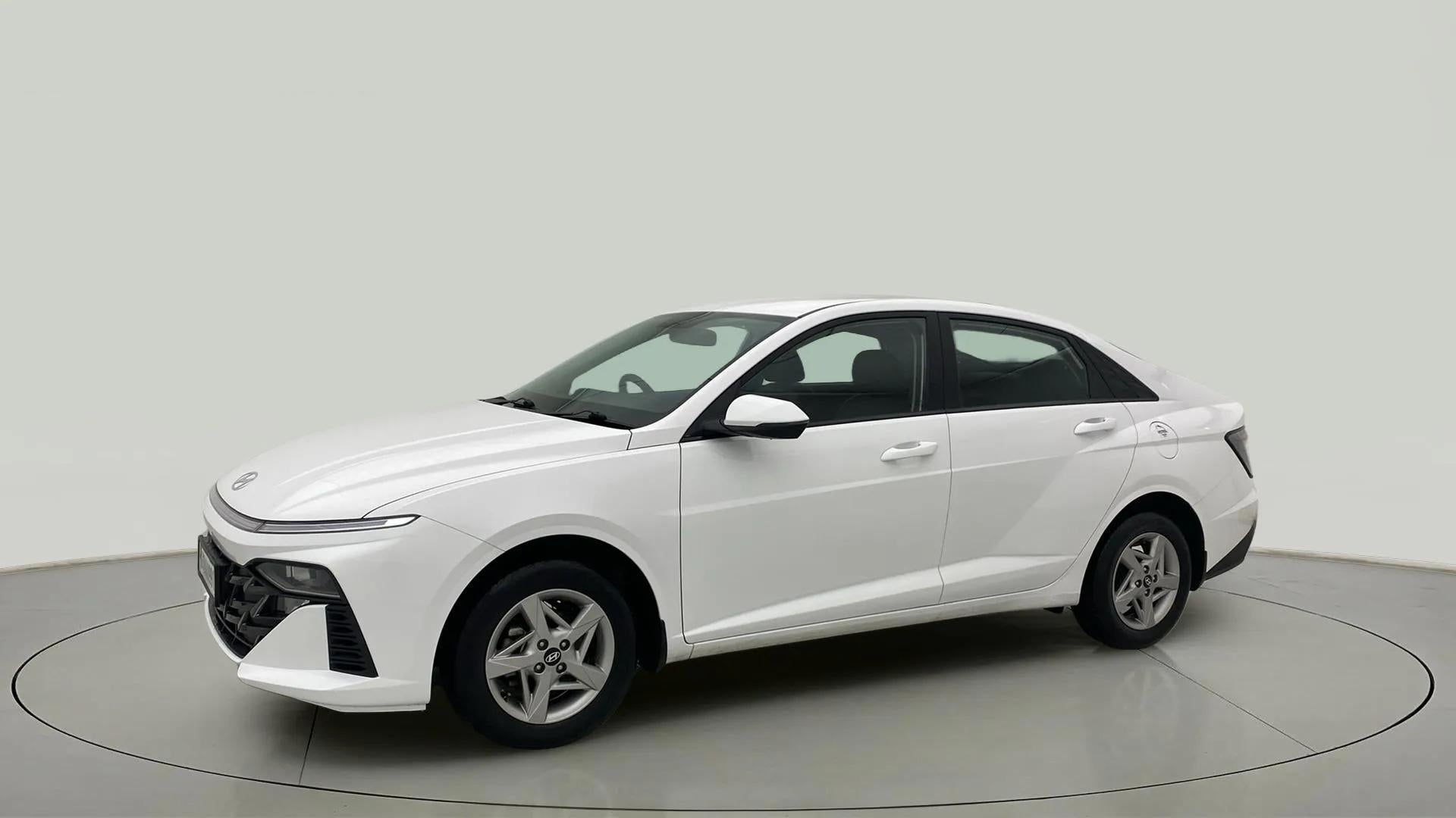 Front side view of a Atlas White Hyundai Verna