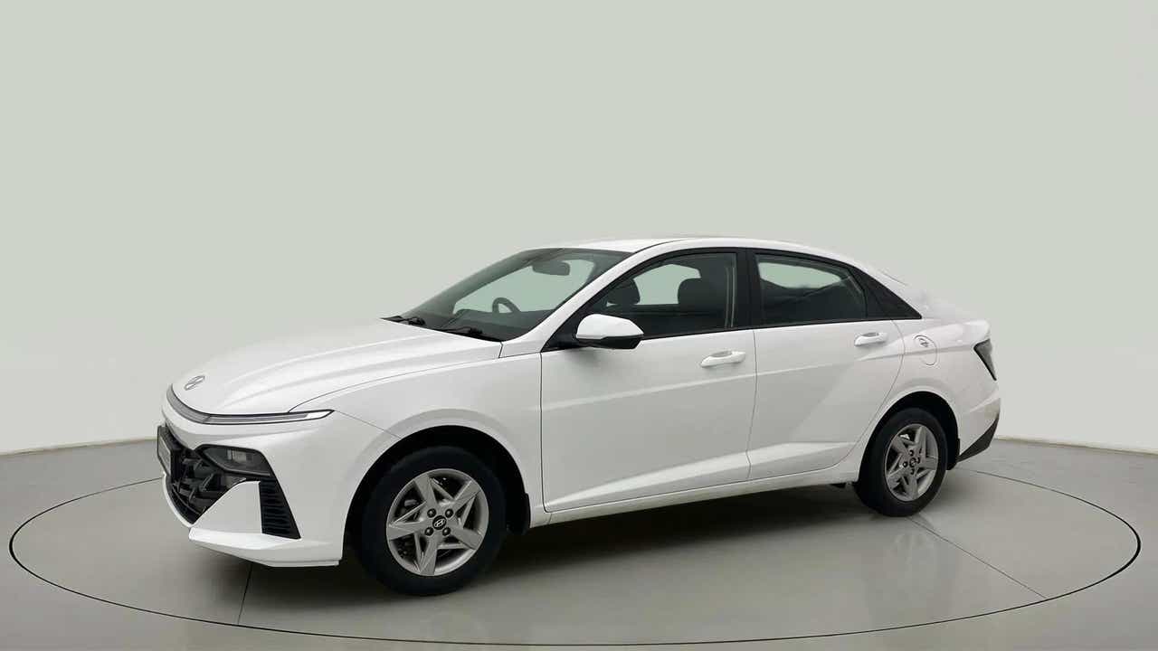 Front side view of a Atlas White Hyundai Verna