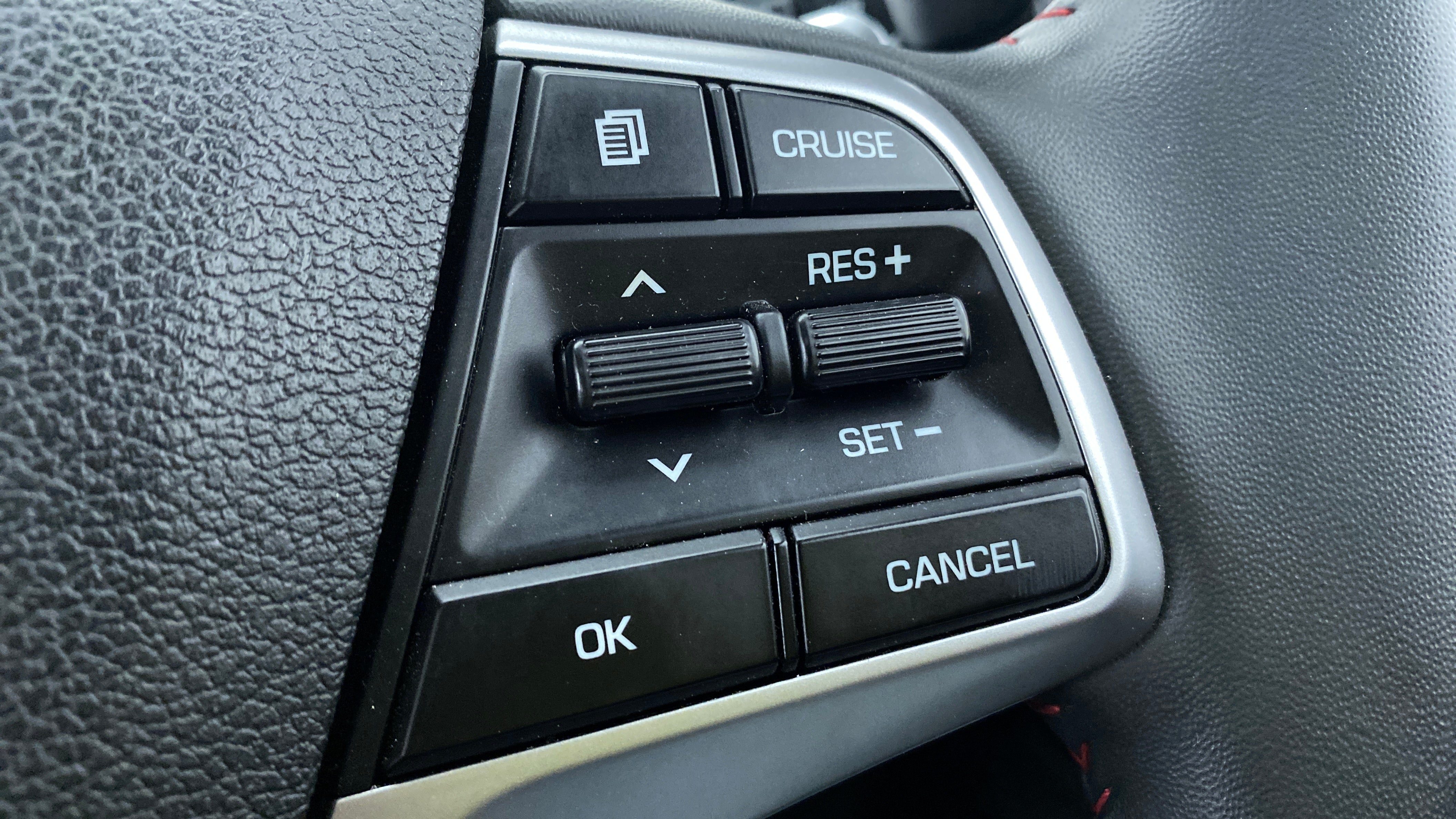 Close-up of cruise control buttons on a Hyundai Verna