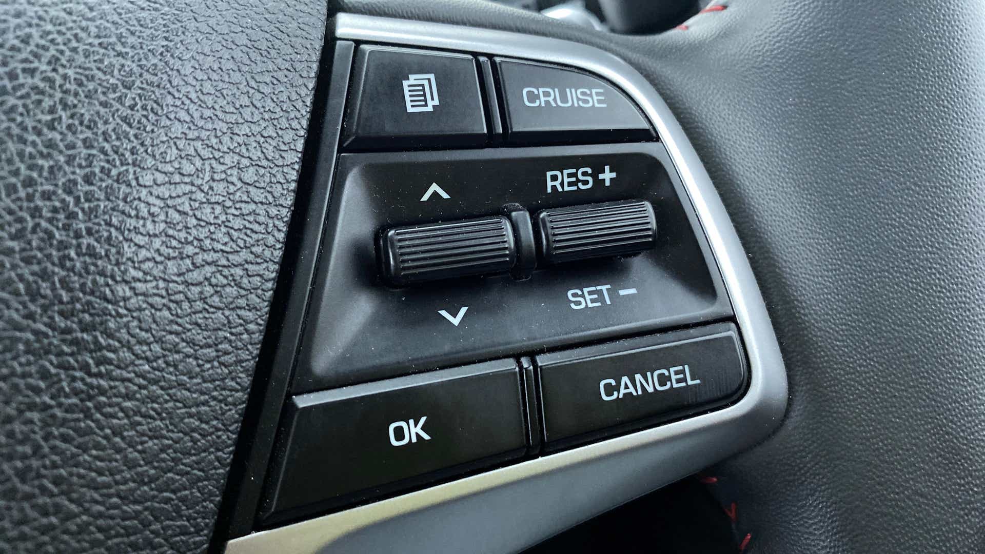 Close-up of cruise control buttons on a Hyundai Verna