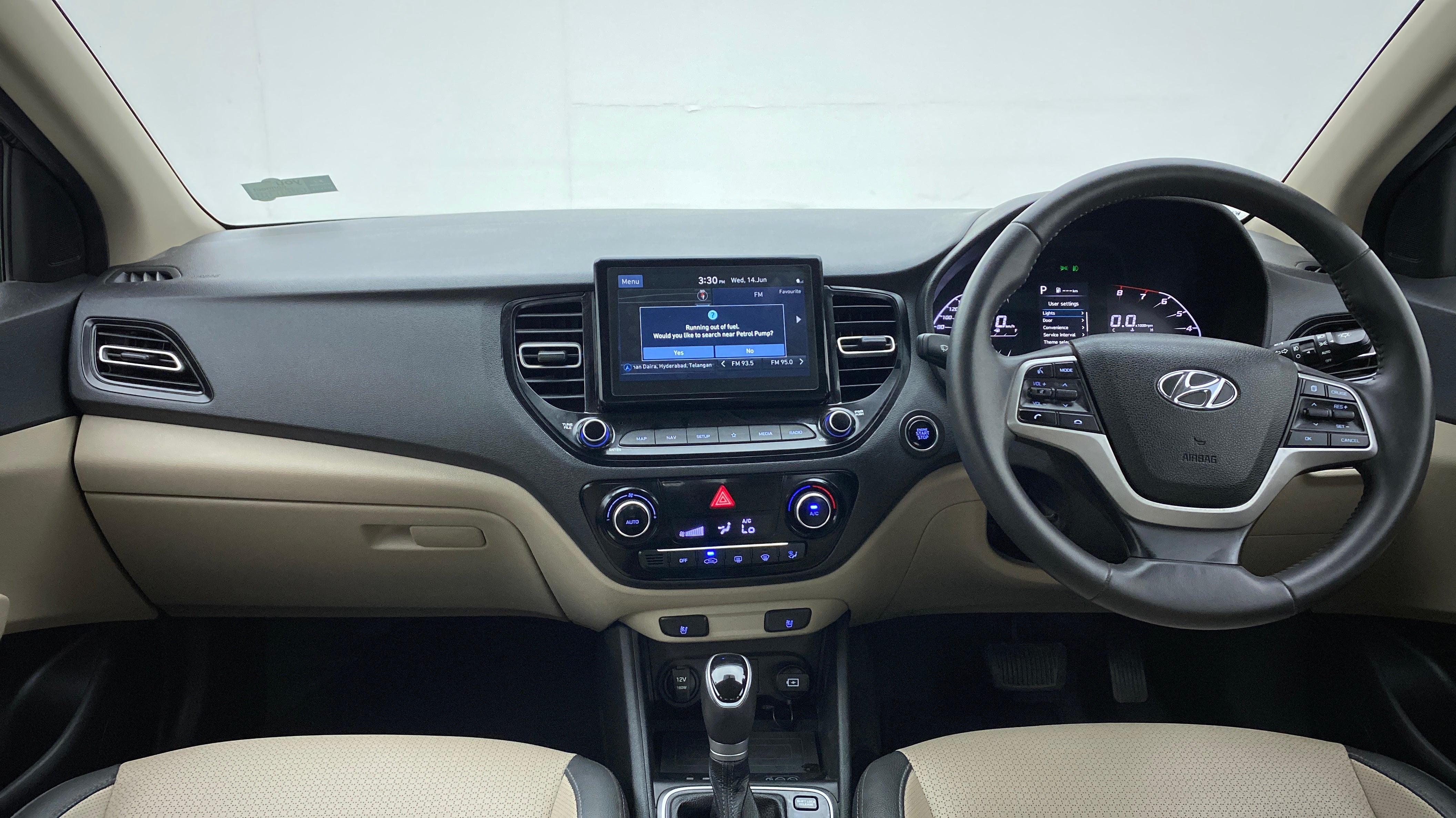 Dashboard and steering wheel view of a Hyundai Verna
