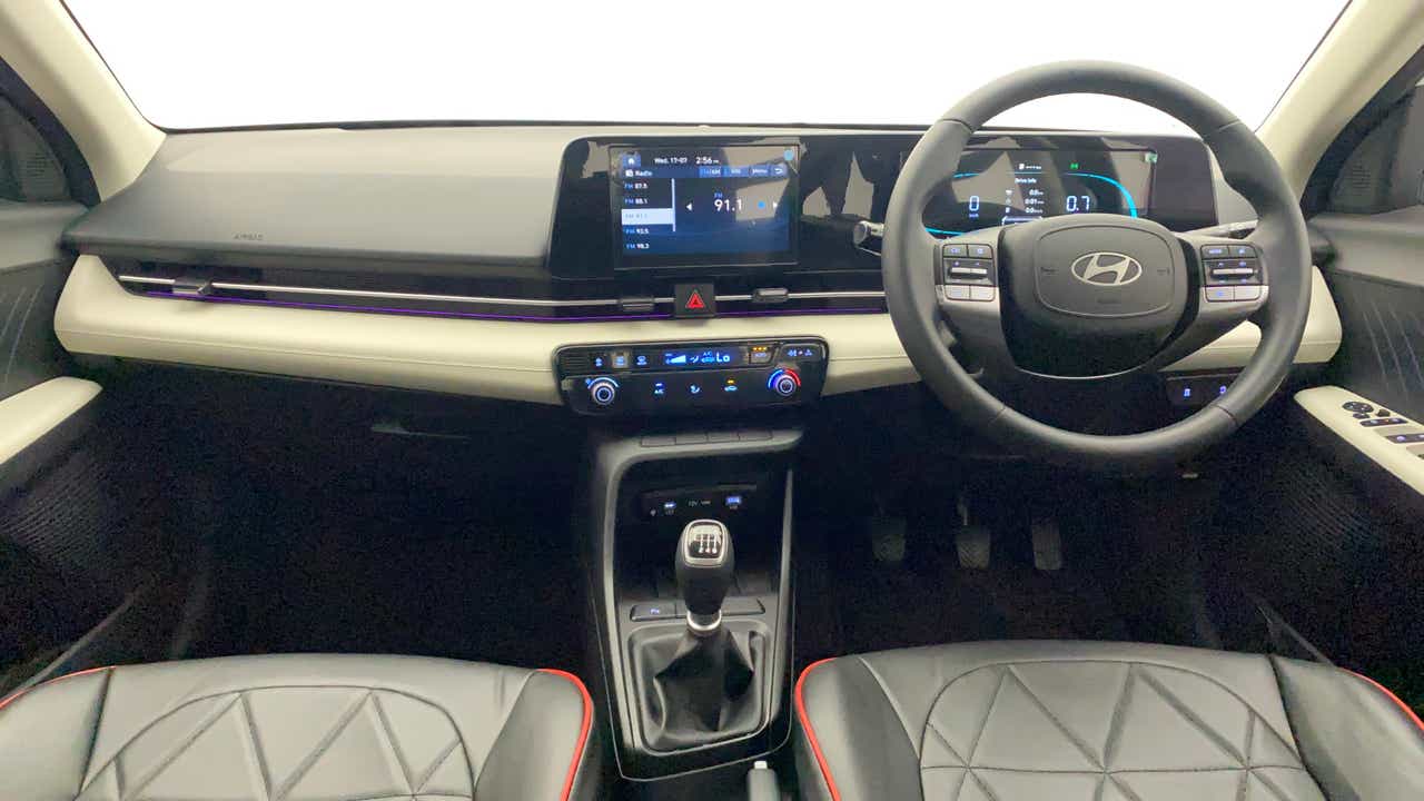 Interior dashboard and steering wheel of a Hyundai Verna