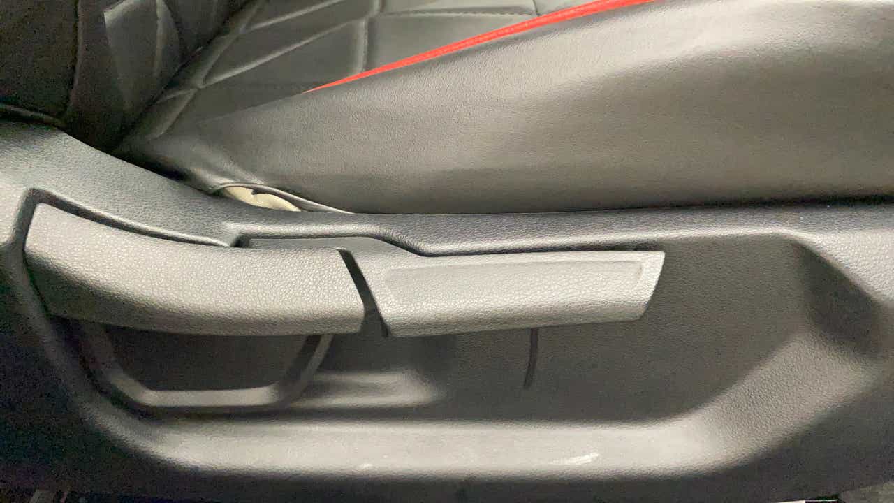 Seat adjustment lever close-up of a Hyundai Verna