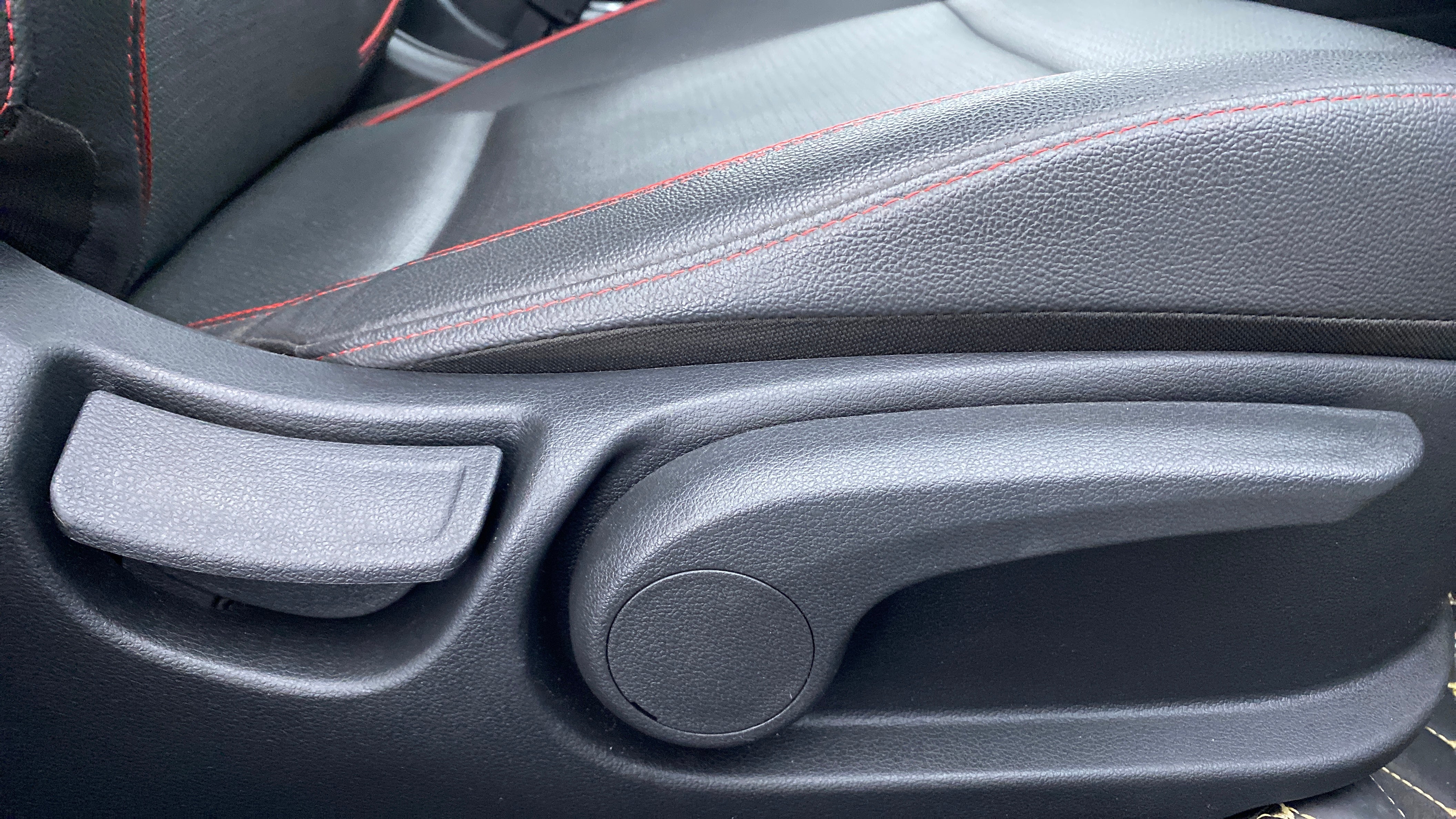 Close-up of the seat adjustment lever of a Hyundai Verna