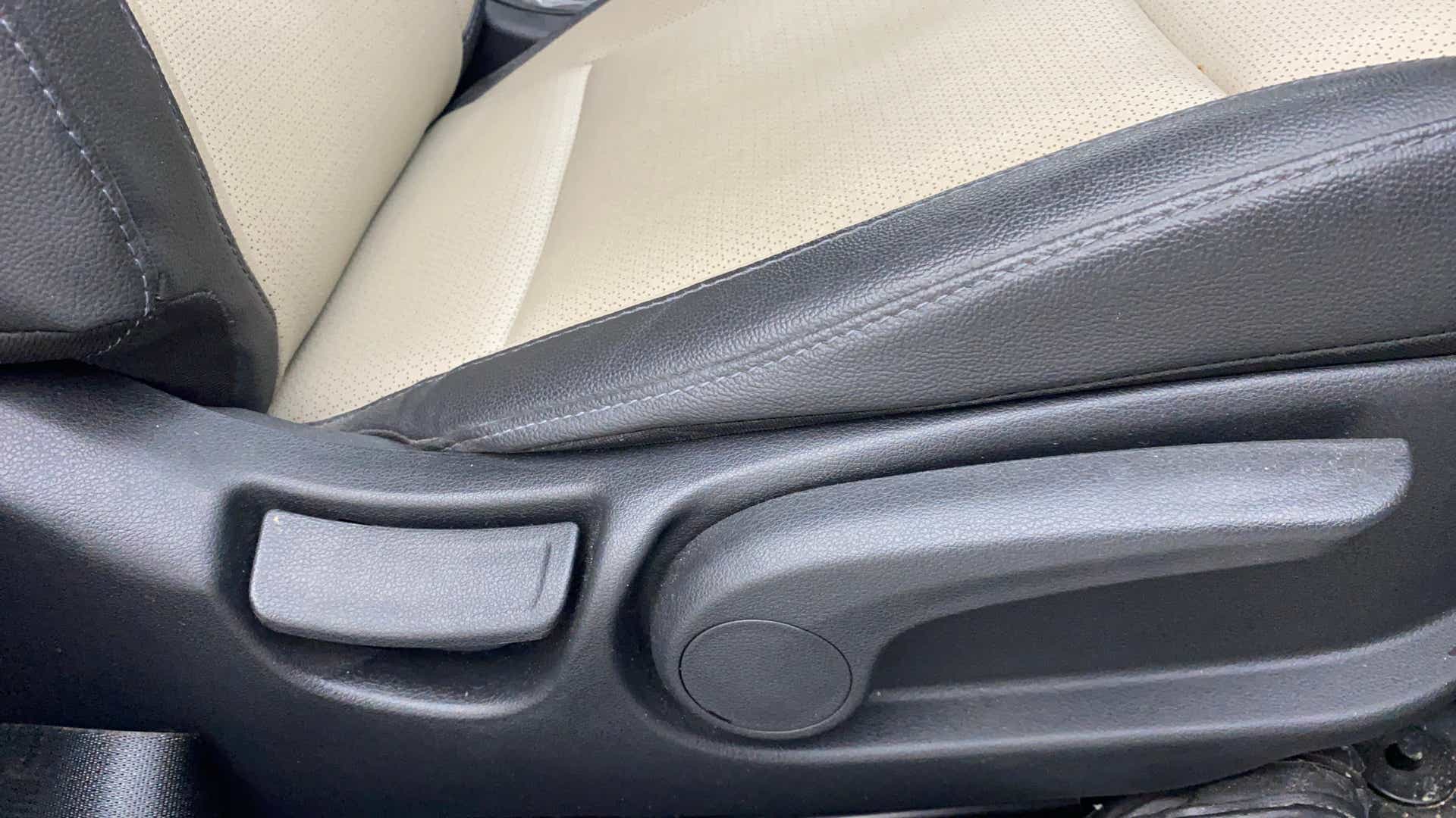 Close-up of a seat adjuster lever in a Hyundai Verna