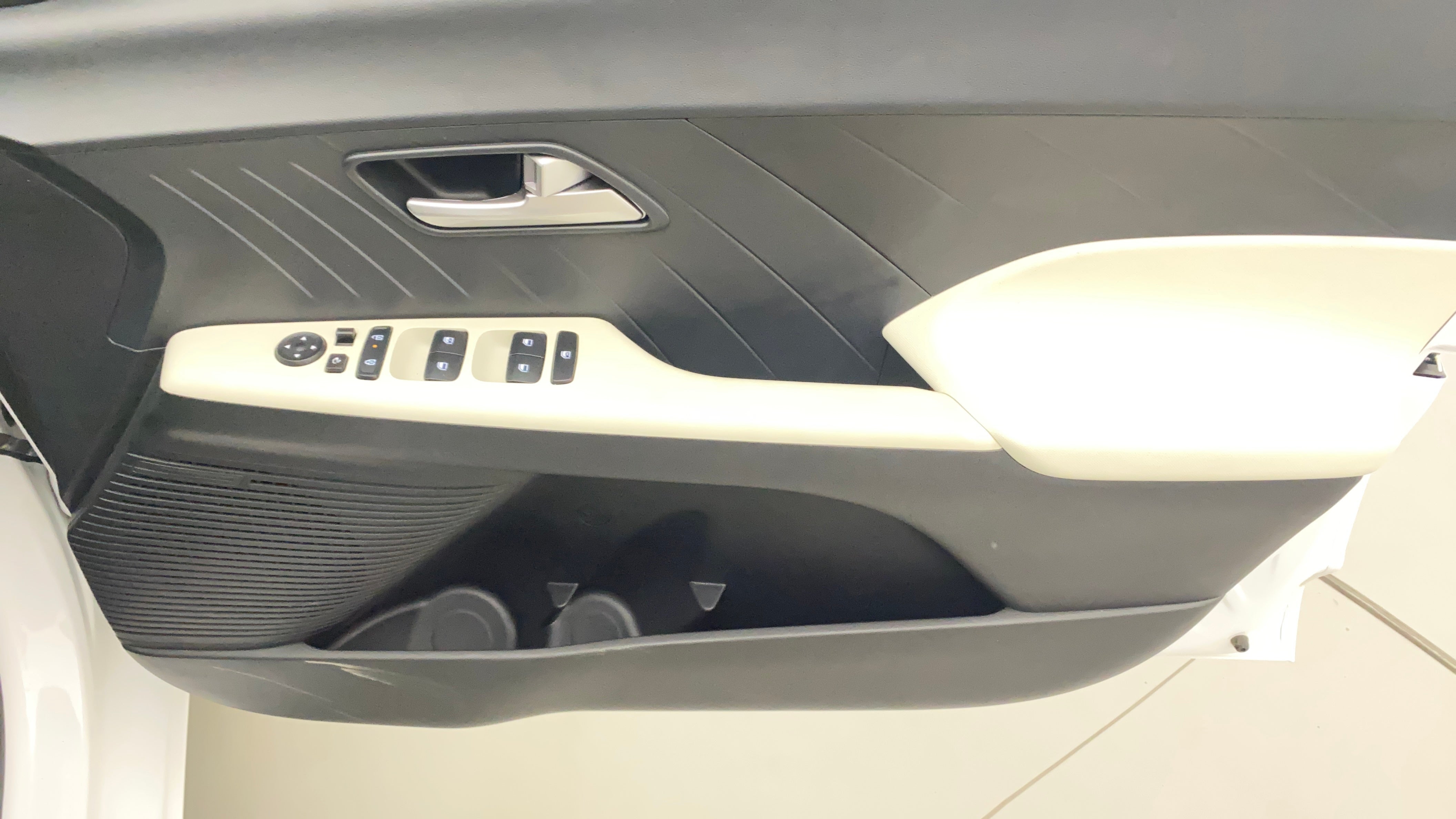 Interior driver door controls of a Hyundai Verna