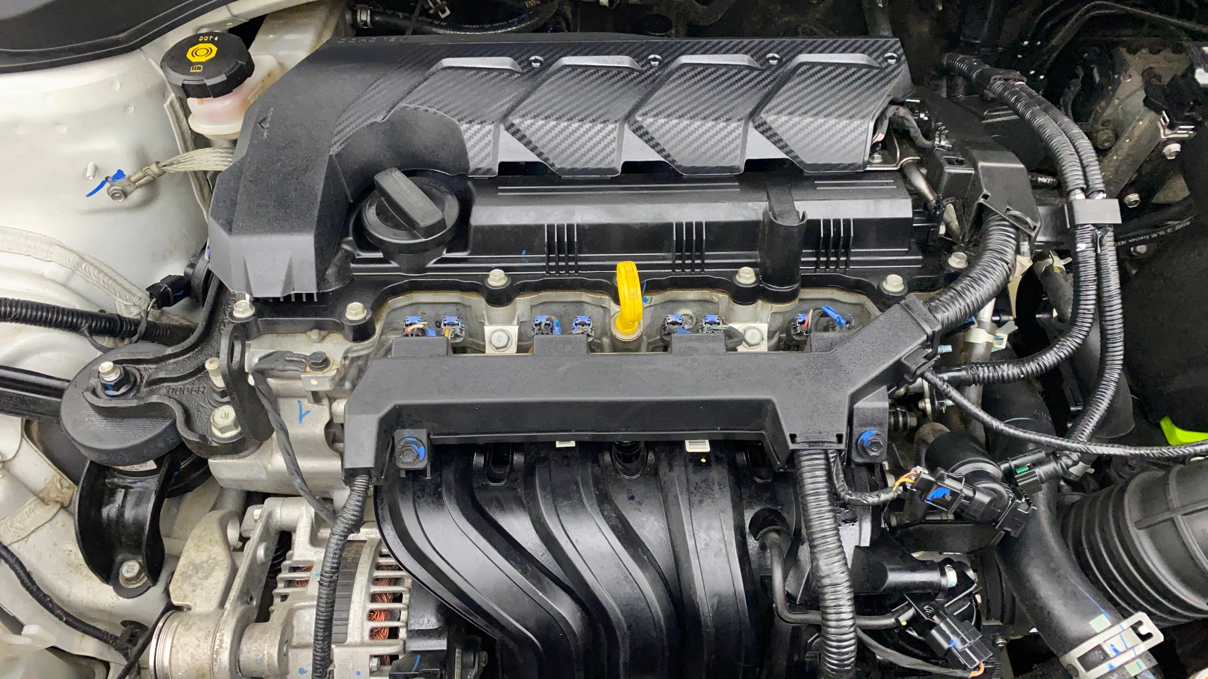 Engine bay view of a Hyundai Verna