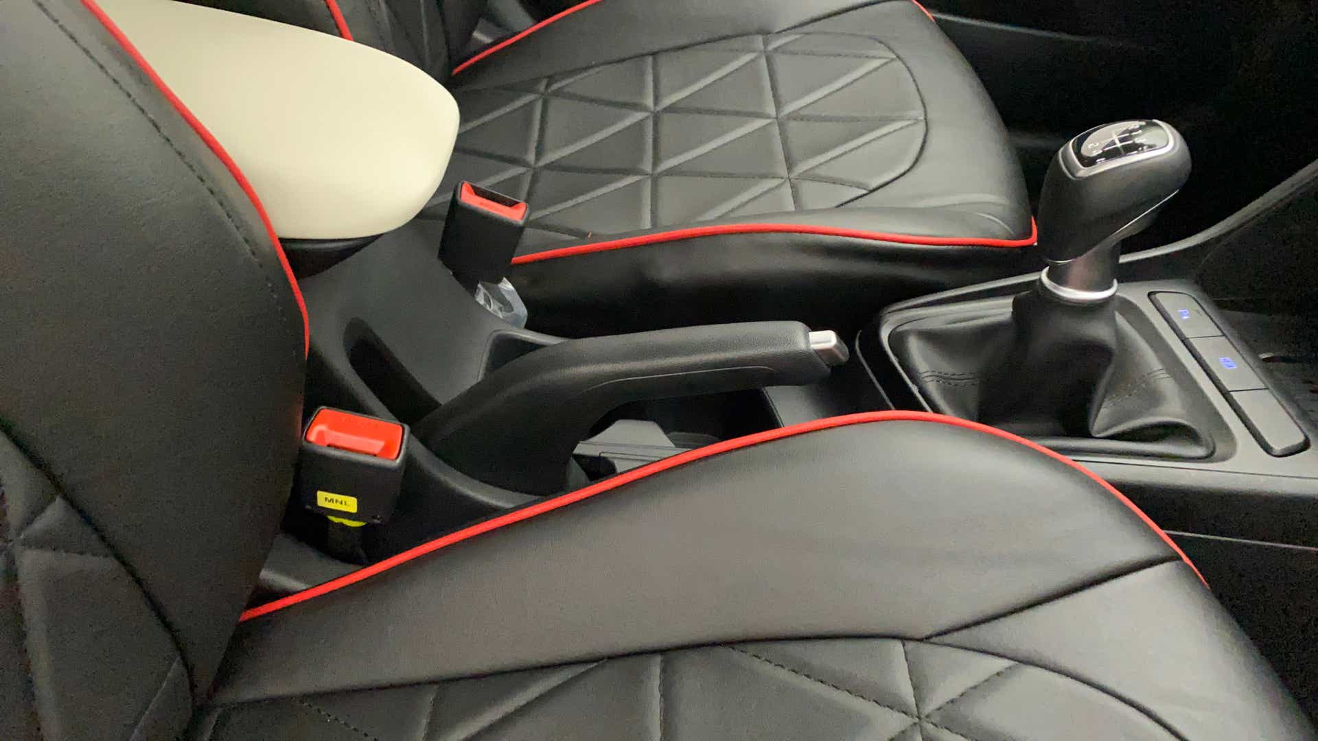 Gear lever and center console area of a Hyundai Verna