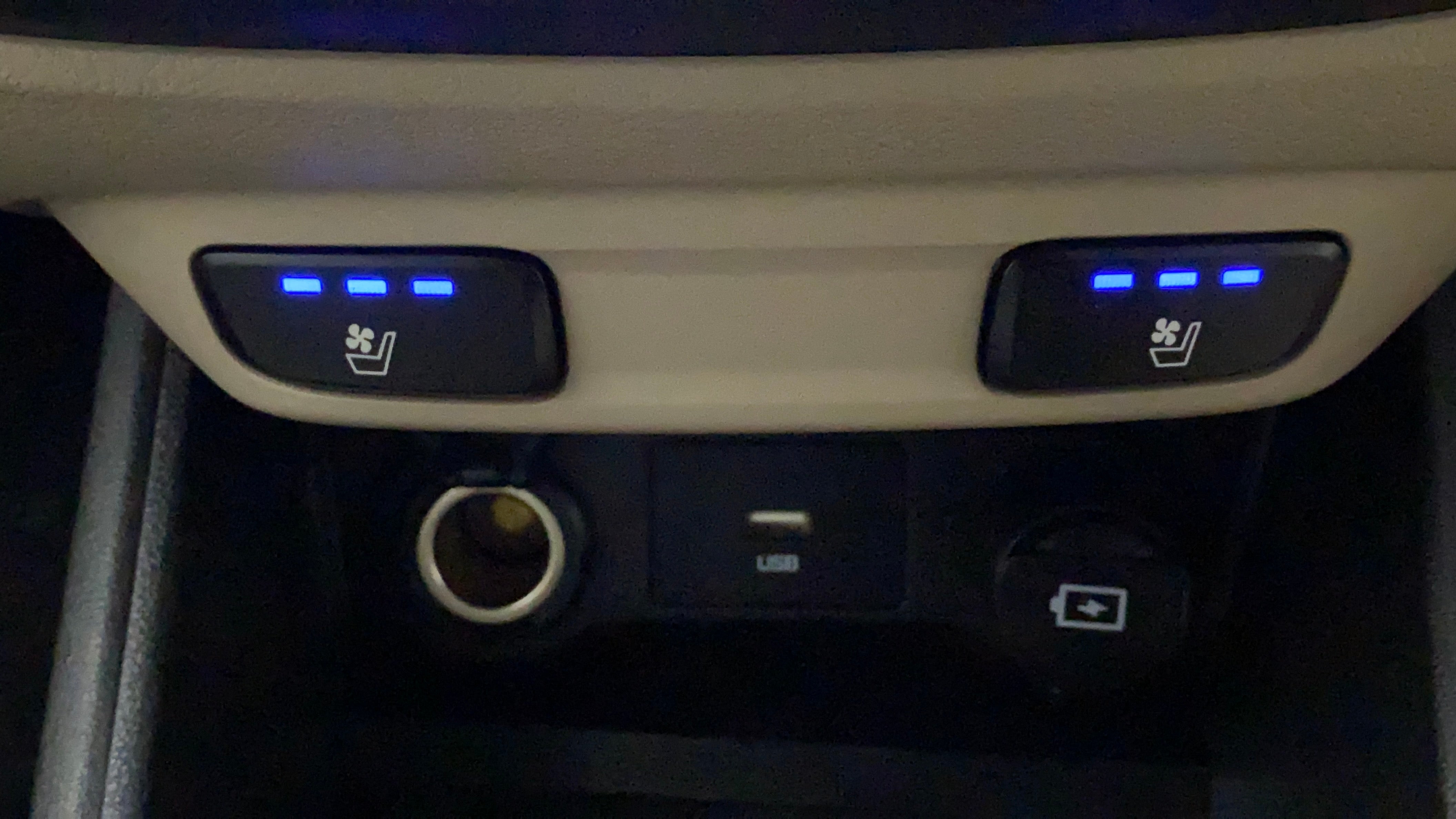 Seat ventilation controls and charging ports of a Hyundai Verna