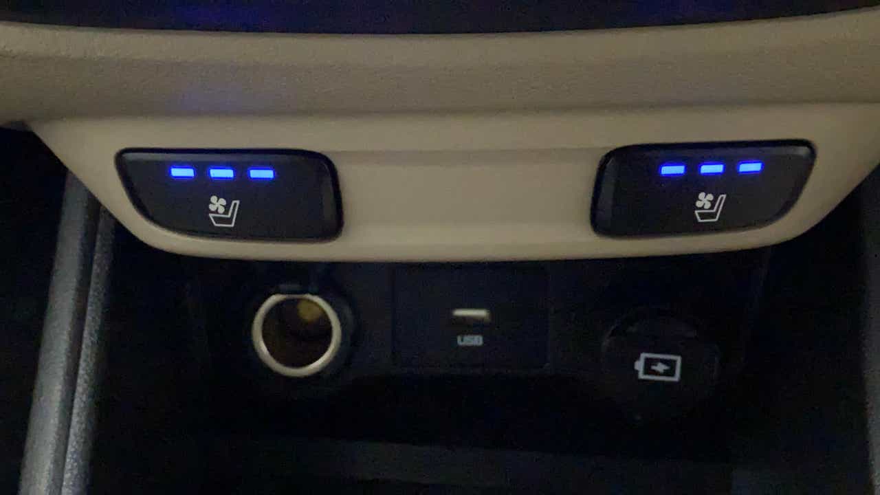 Seat ventilation controls and charging ports of a Hyundai Verna