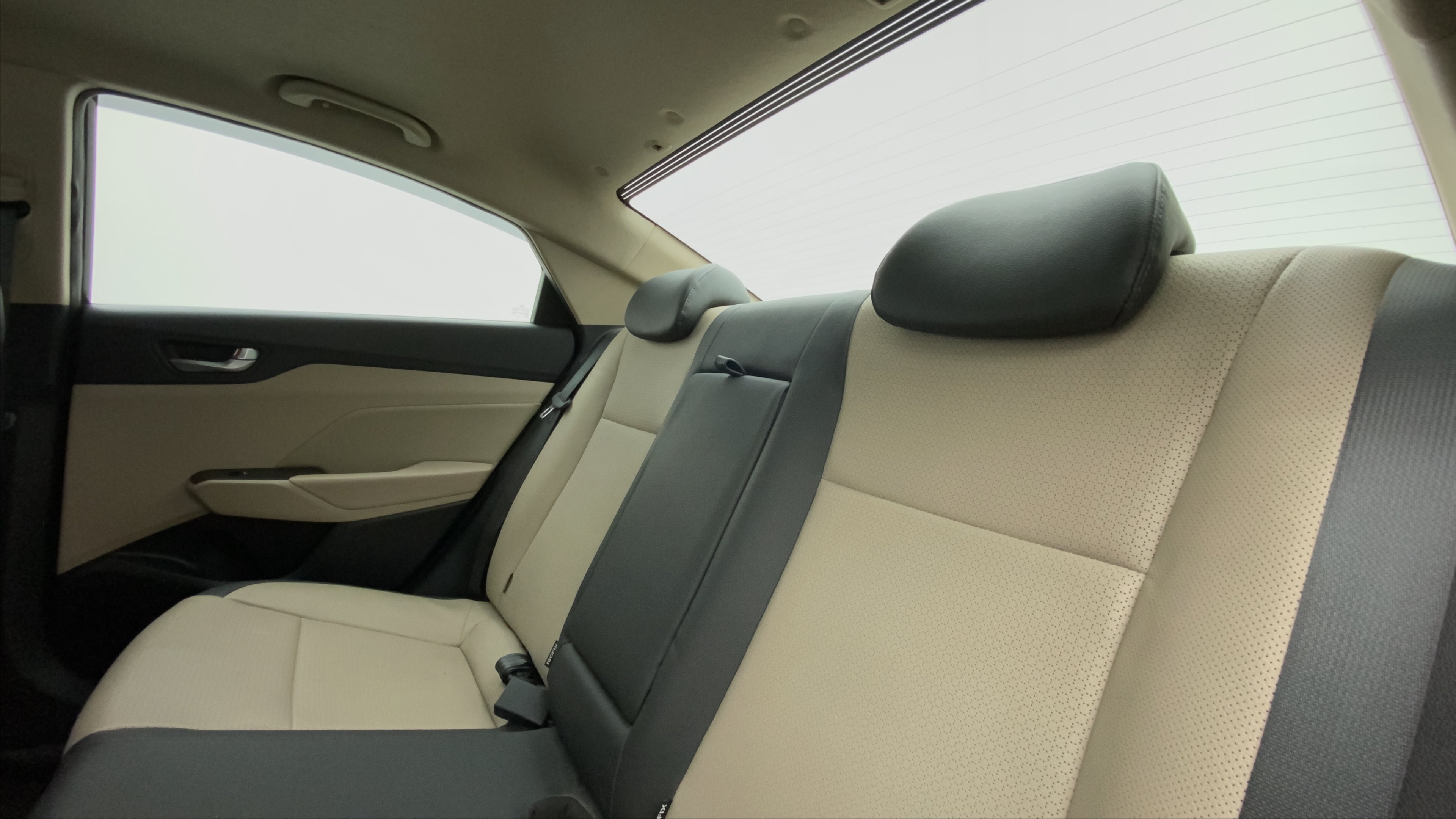 Rear seat interior view of a Hyundai Verna