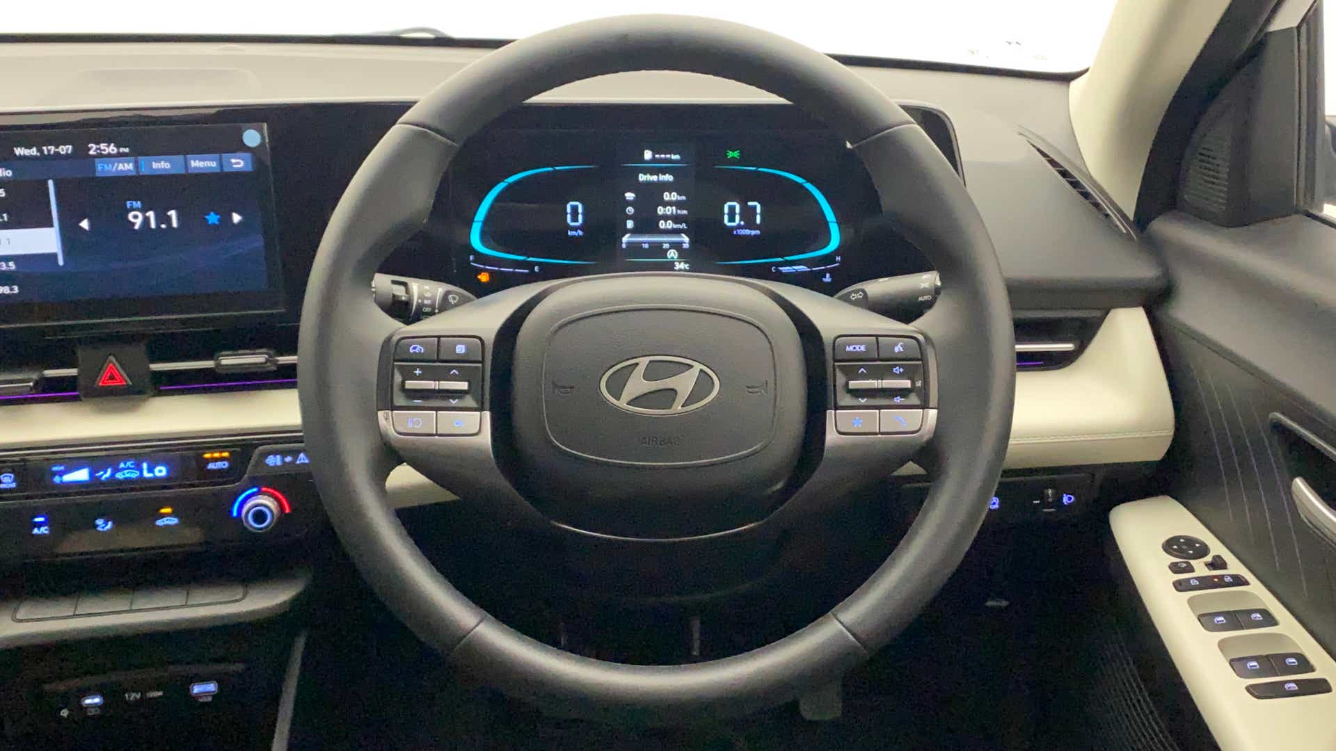 Steering wheel and dashboard view of a Hyundai Verna