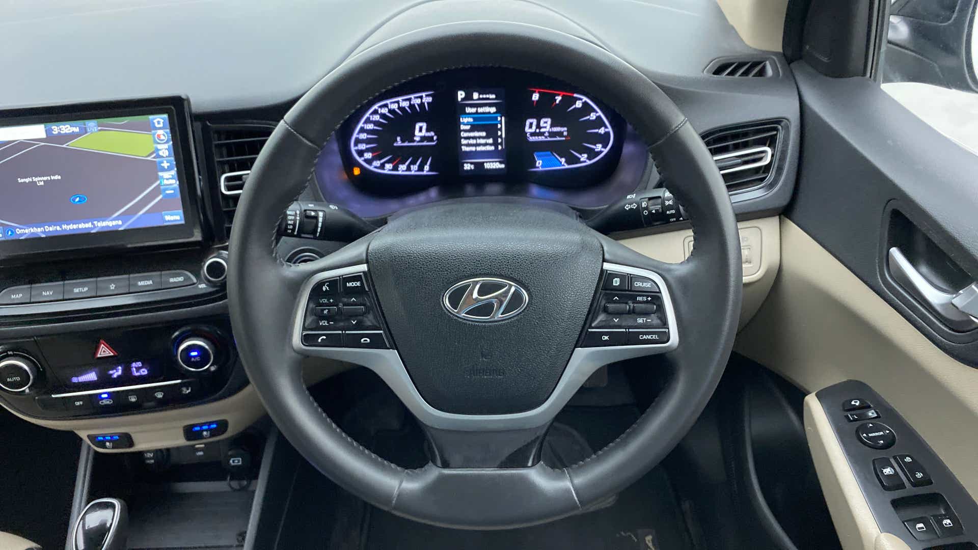 Interior dashboard and steering wheel of a Hyundai Verna