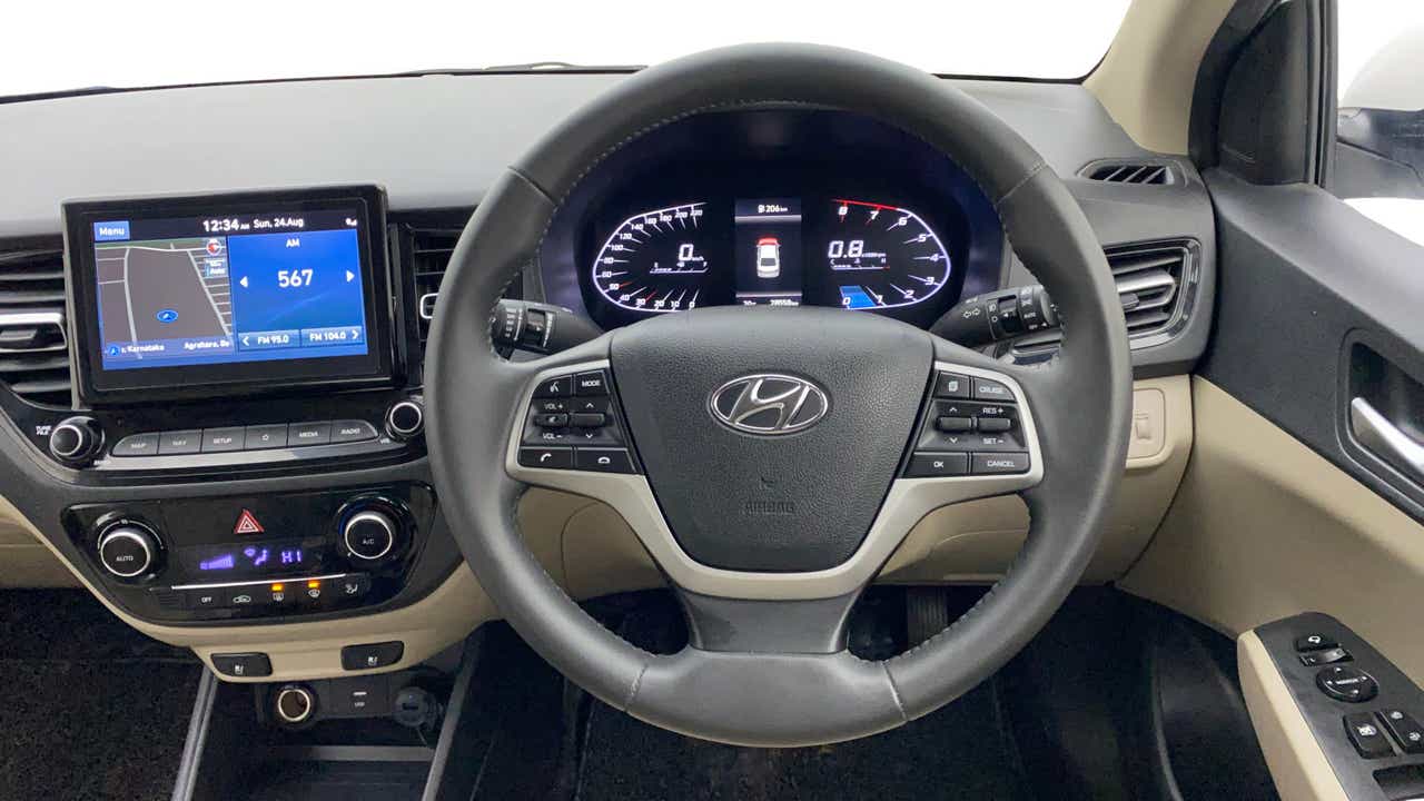 Dashboard and steering wheel of a Hyundai Verna