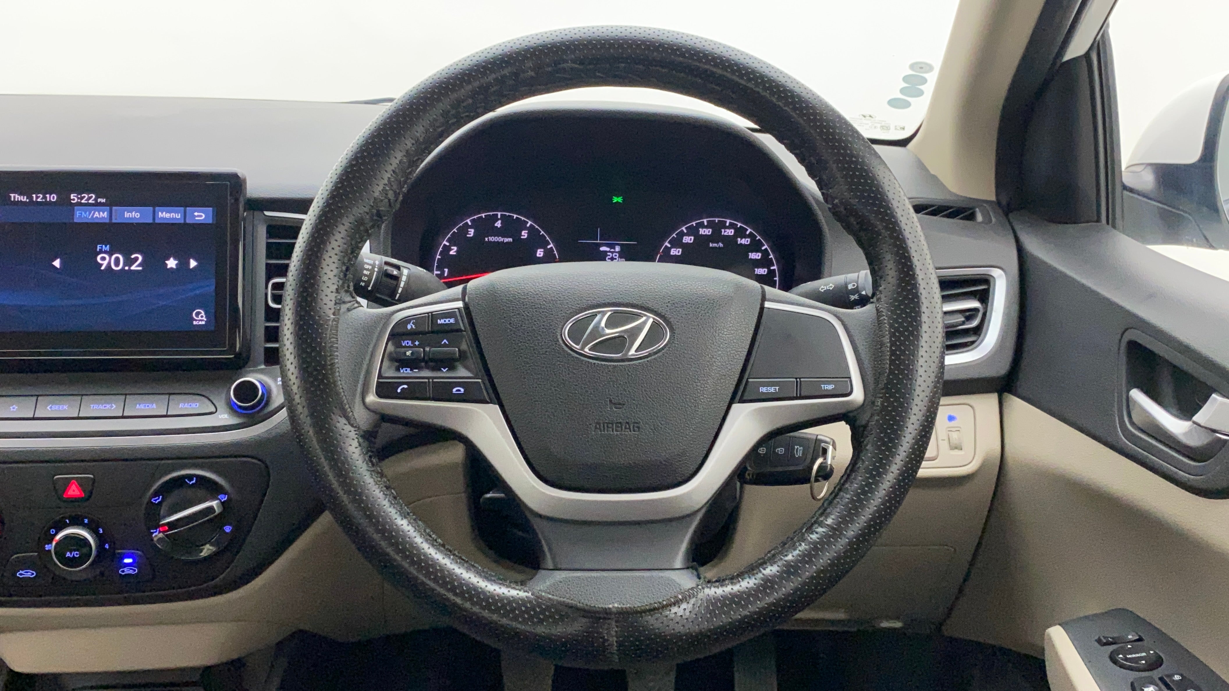 Dashboard and steering wheel view of a Hyundai Verna
