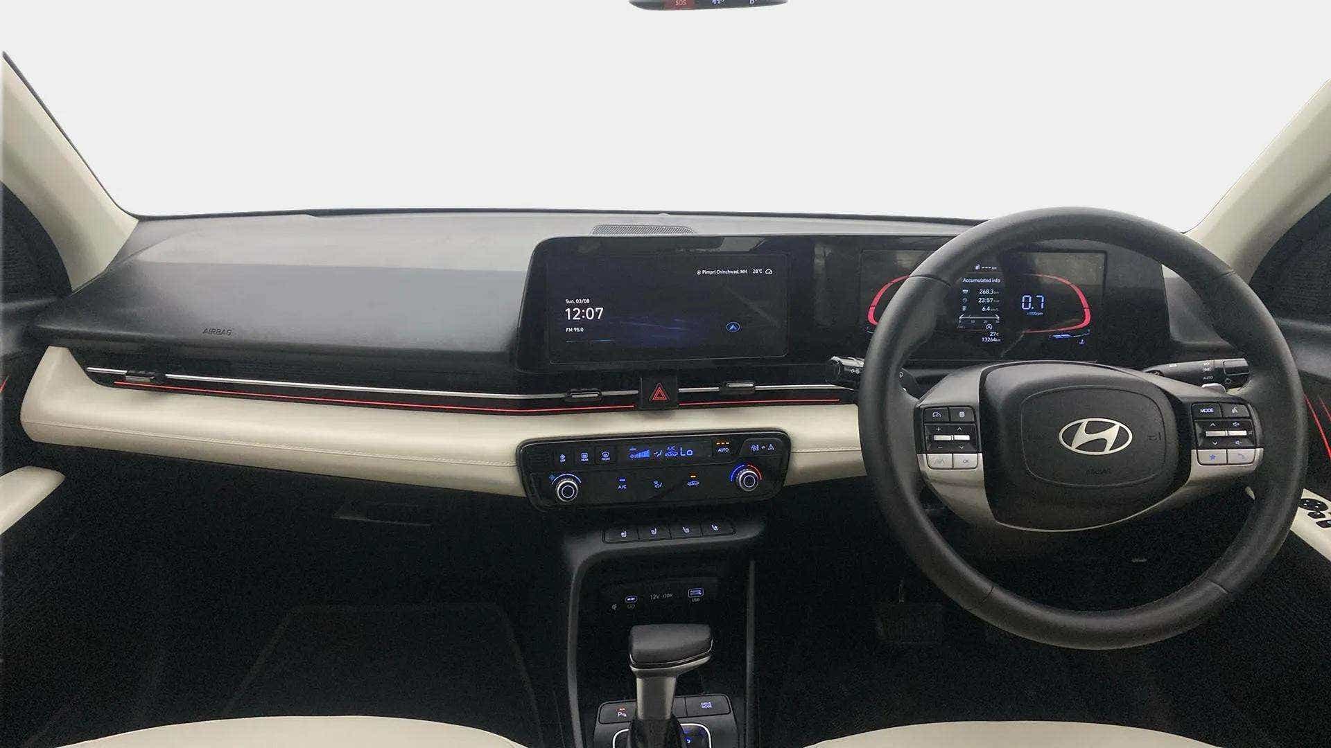 Dashboard and steering wheel view of a Hyundai Verna