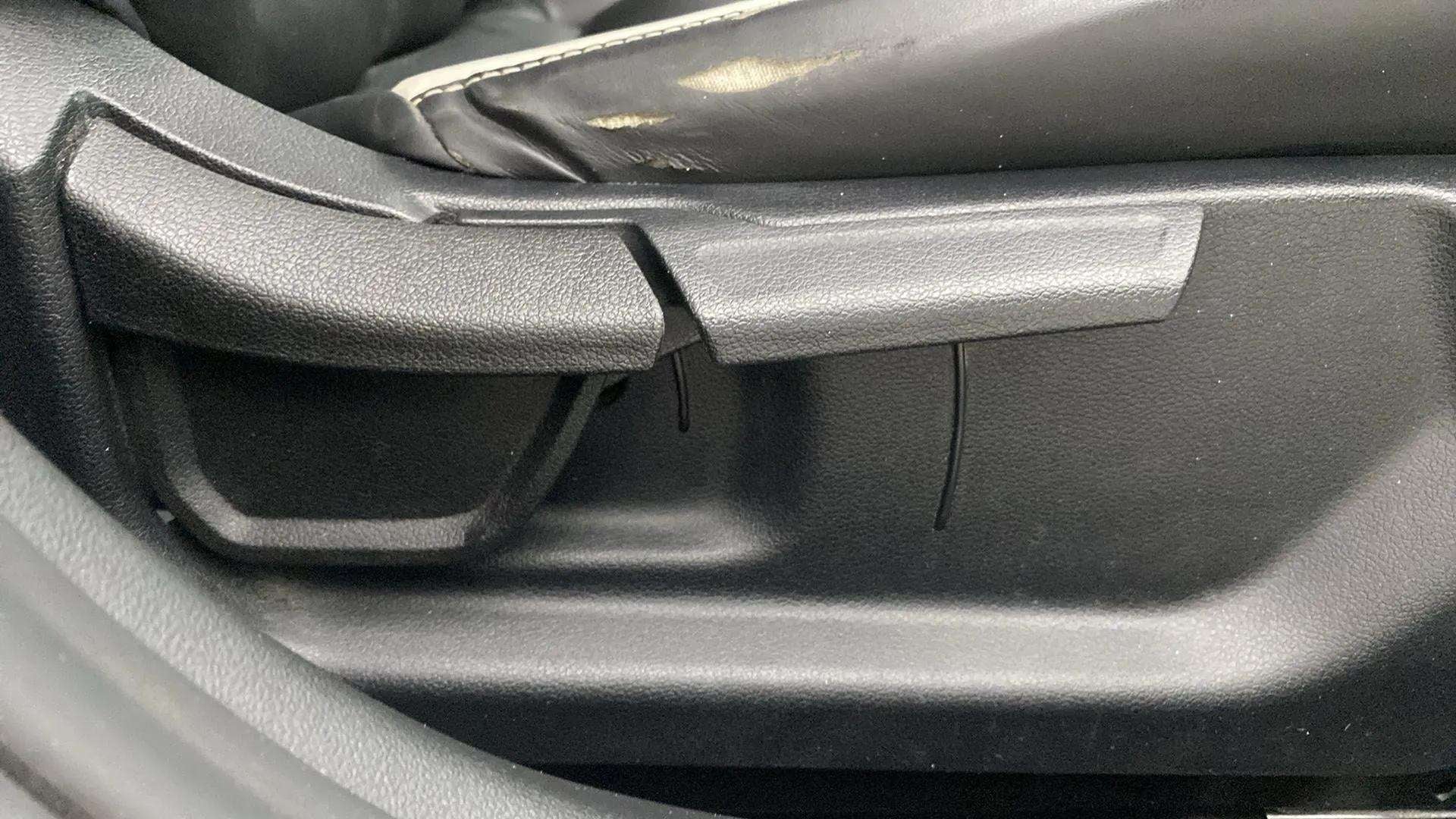 Seat adjustment lever close-up of a Hyundai Verna