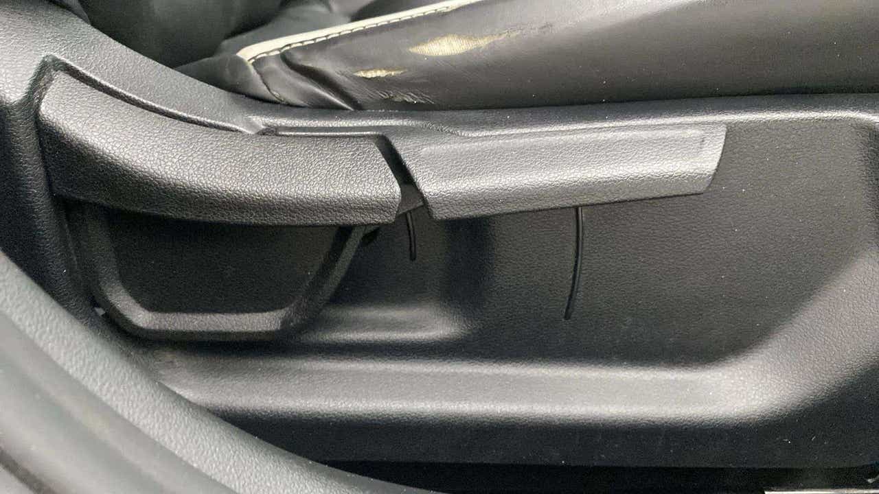 Seat adjustment lever close-up of a Hyundai Verna