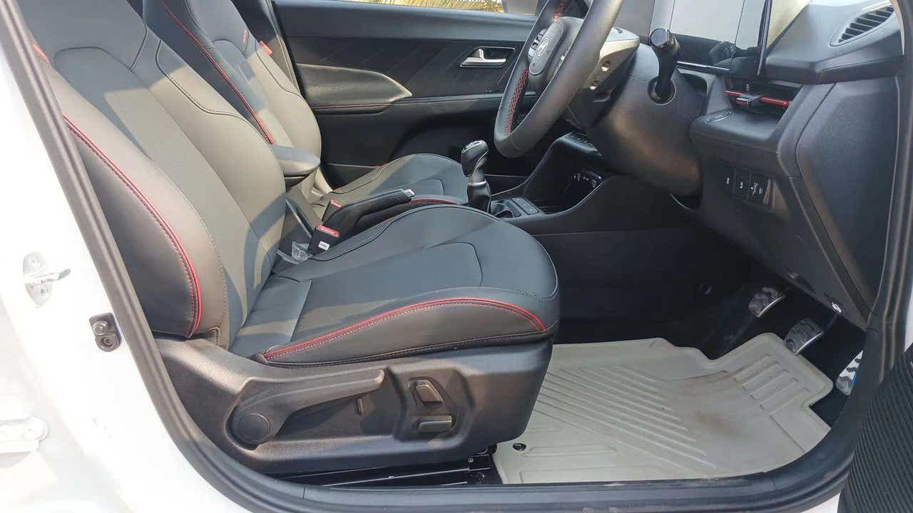 Front interior seats and dashboard of a Hyundai Verna