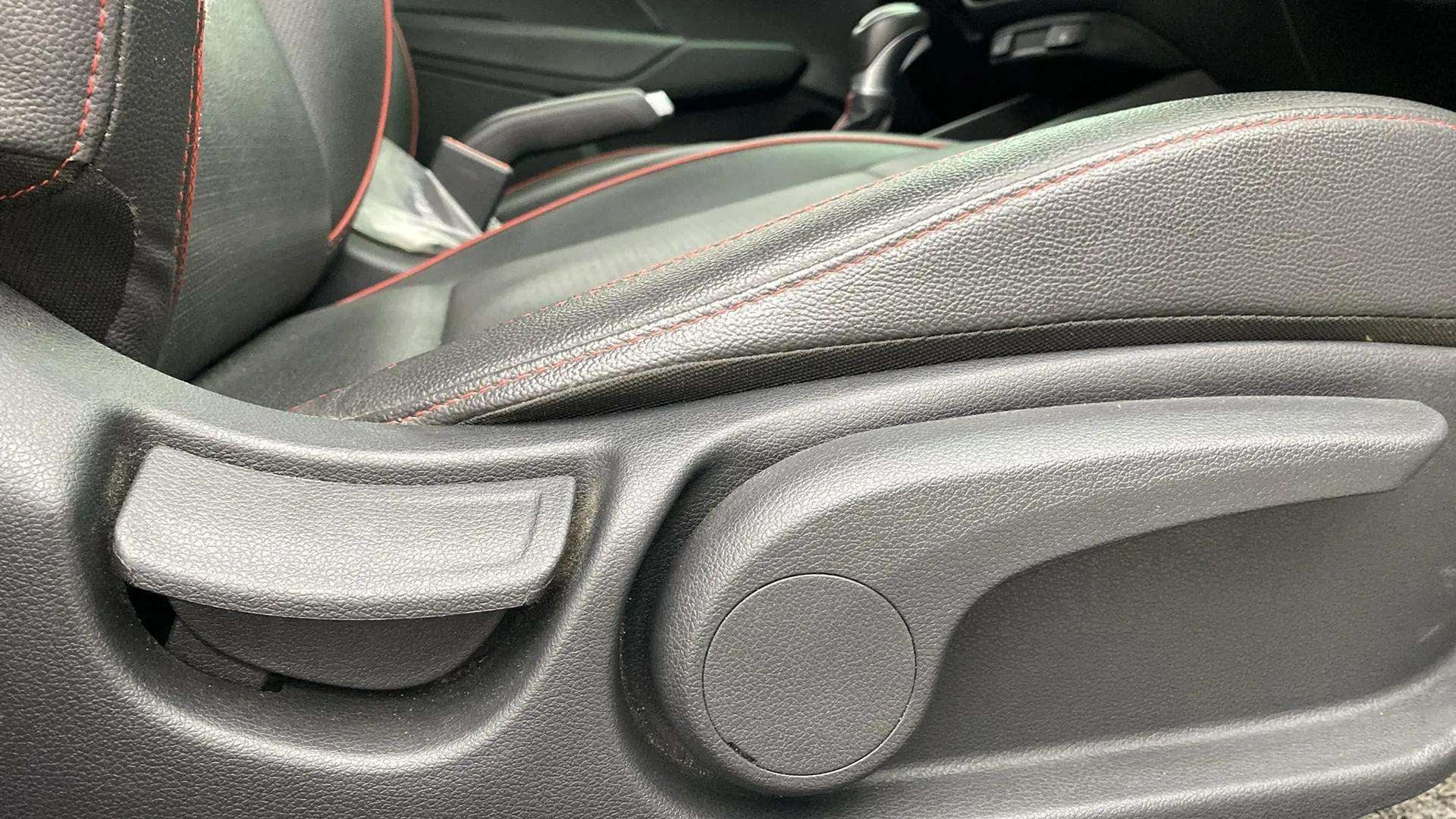 Close-up of the seat adjustment controls in a Hyundai Verna