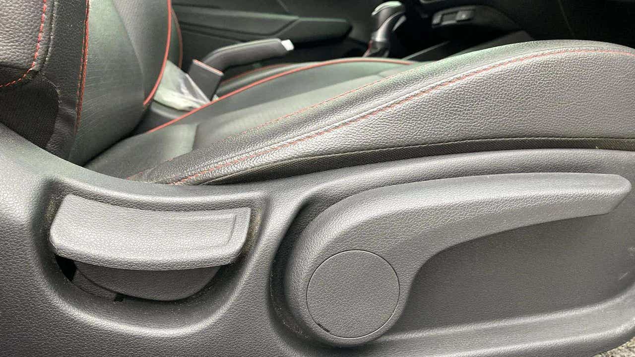 Close-up of the seat adjustment controls in a Hyundai Verna