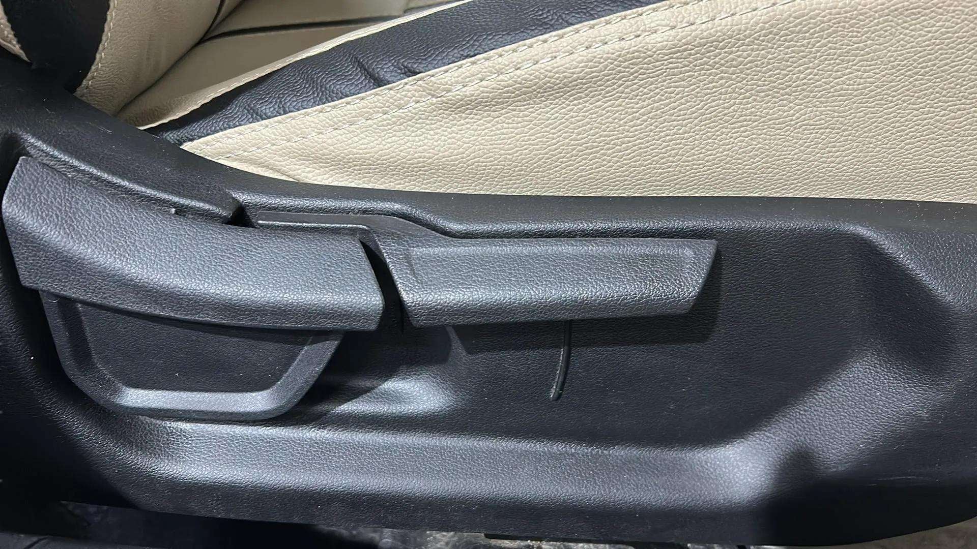 Close-up of the seat adjustment lever in a Hyundai Verna