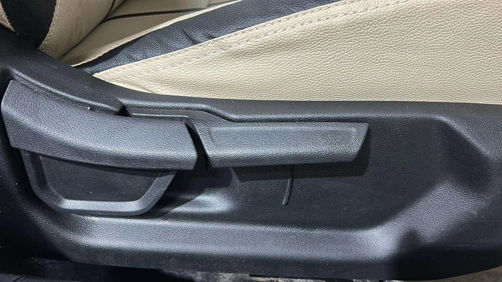 Close-up of the seat adjustment lever in a Hyundai Verna