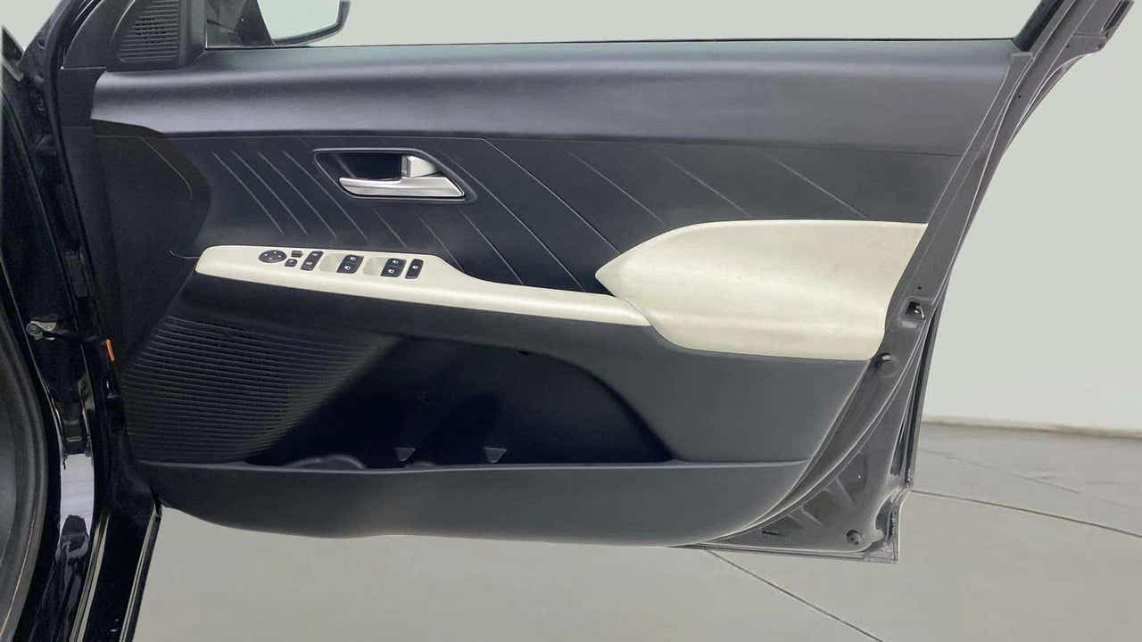 Driver side interior door panel of a Hyundai Verna