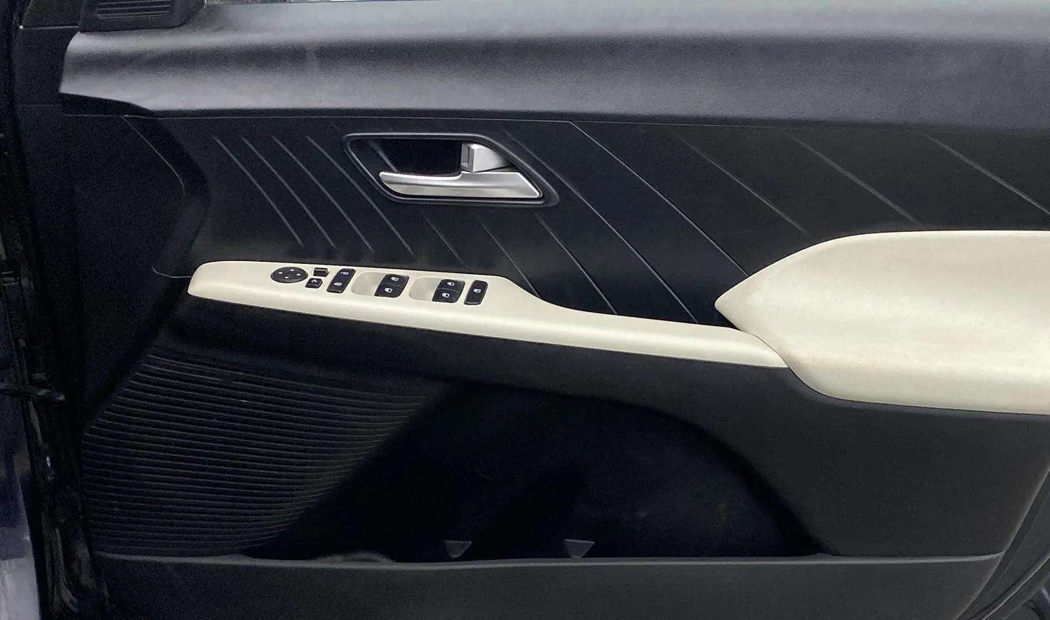 Driver side interior door panel of a Hyundai Verna