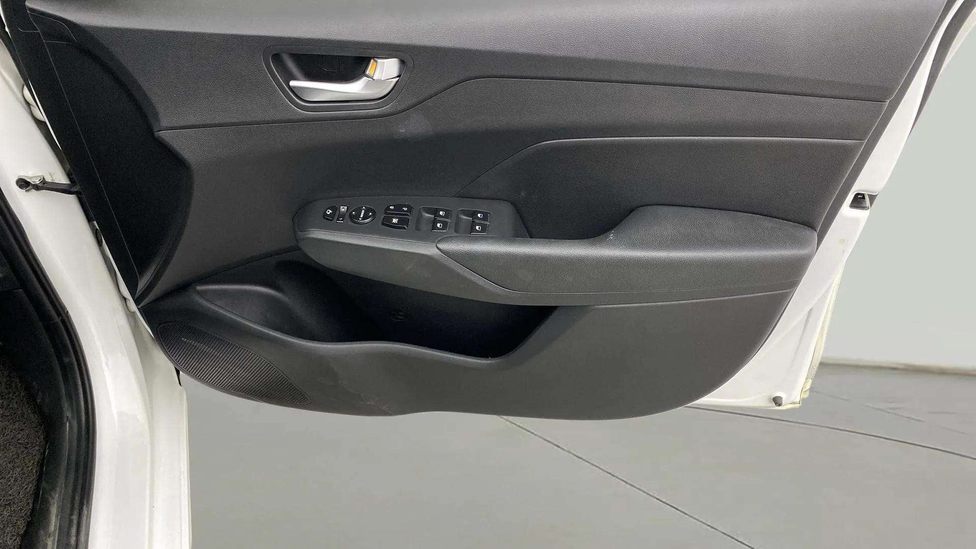 Interior driver side door panel of a Hyundai Verna