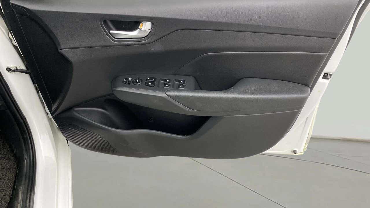 Interior driver side door panel of a Hyundai Verna