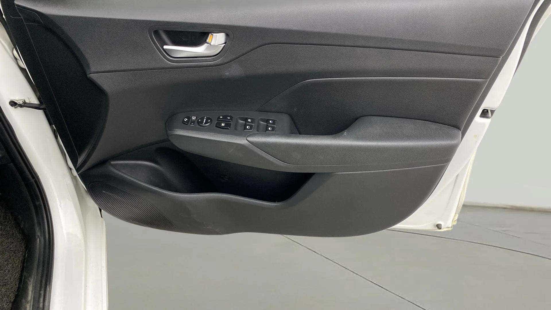 Interior driver side door panel of a Hyundai Verna