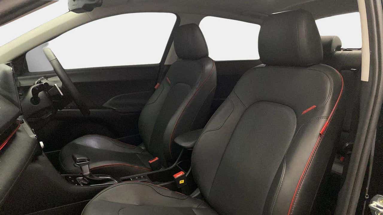 Front seats and dashboard view of a Hyundai Verna