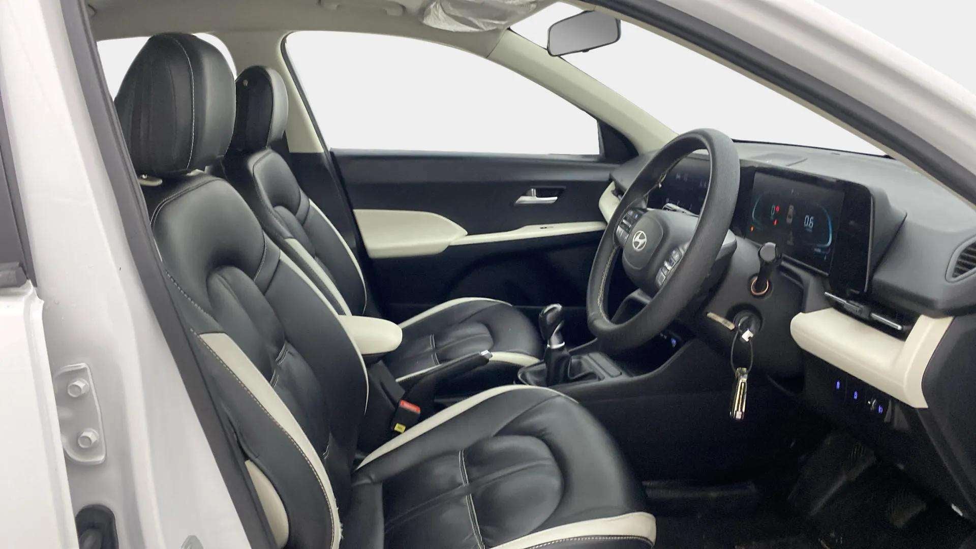 Interior front seats and dashboard of a Hyundai Verna
