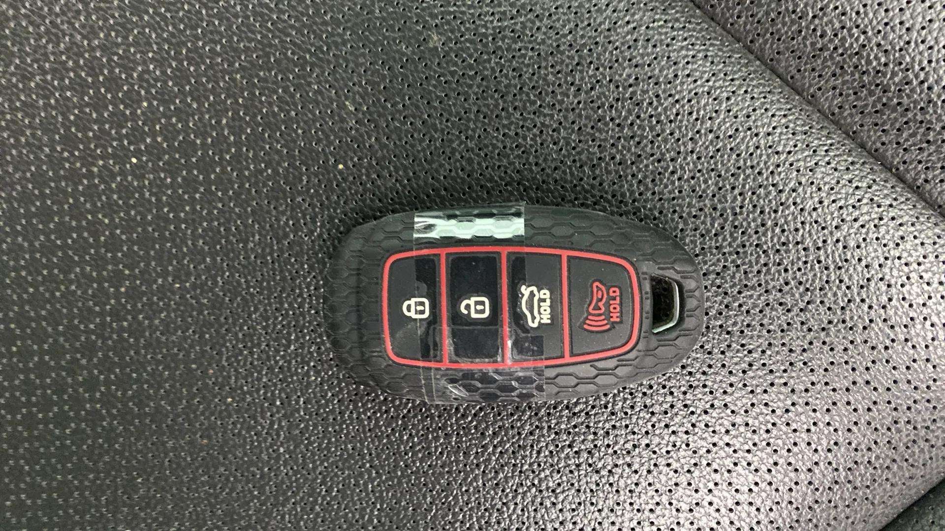 Car key fob on a seat of a Hyundai Verna