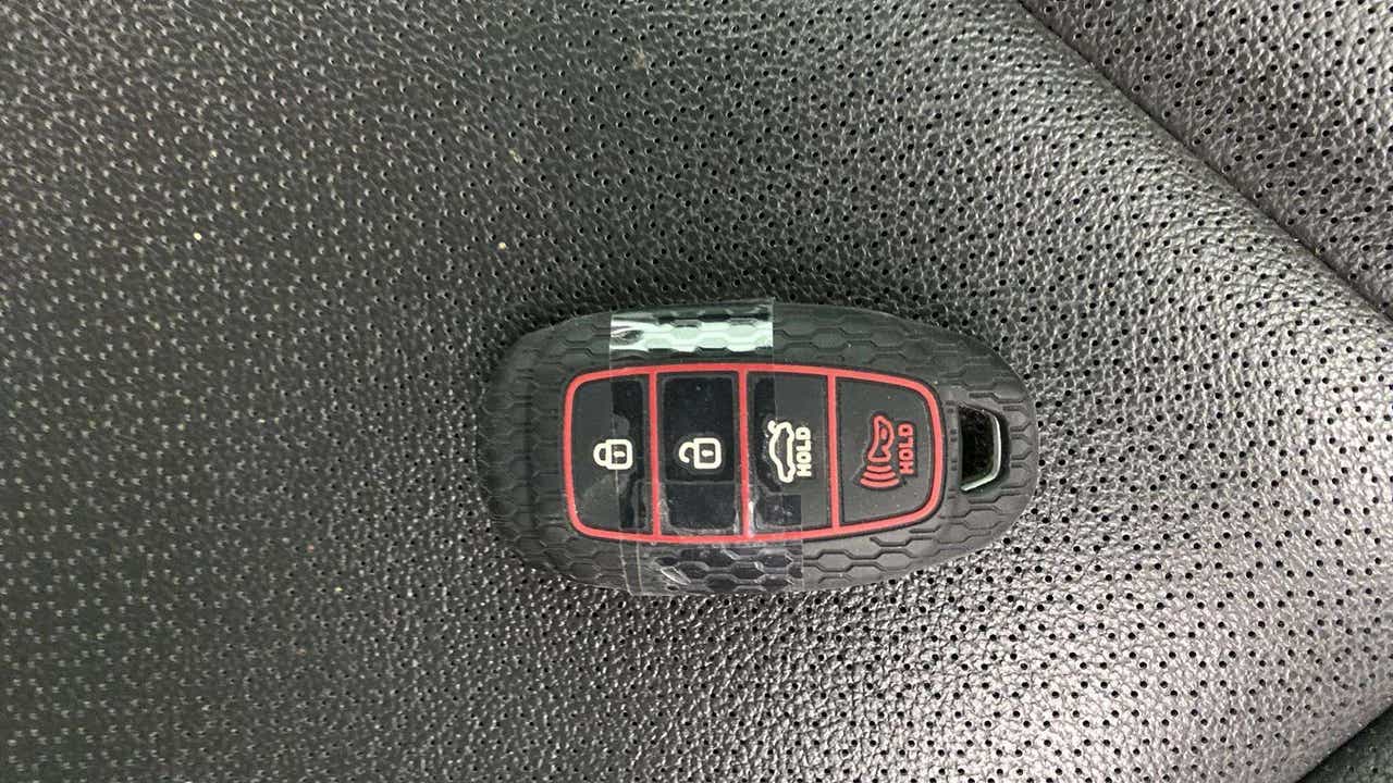 Car key fob on a seat of a Hyundai Verna
