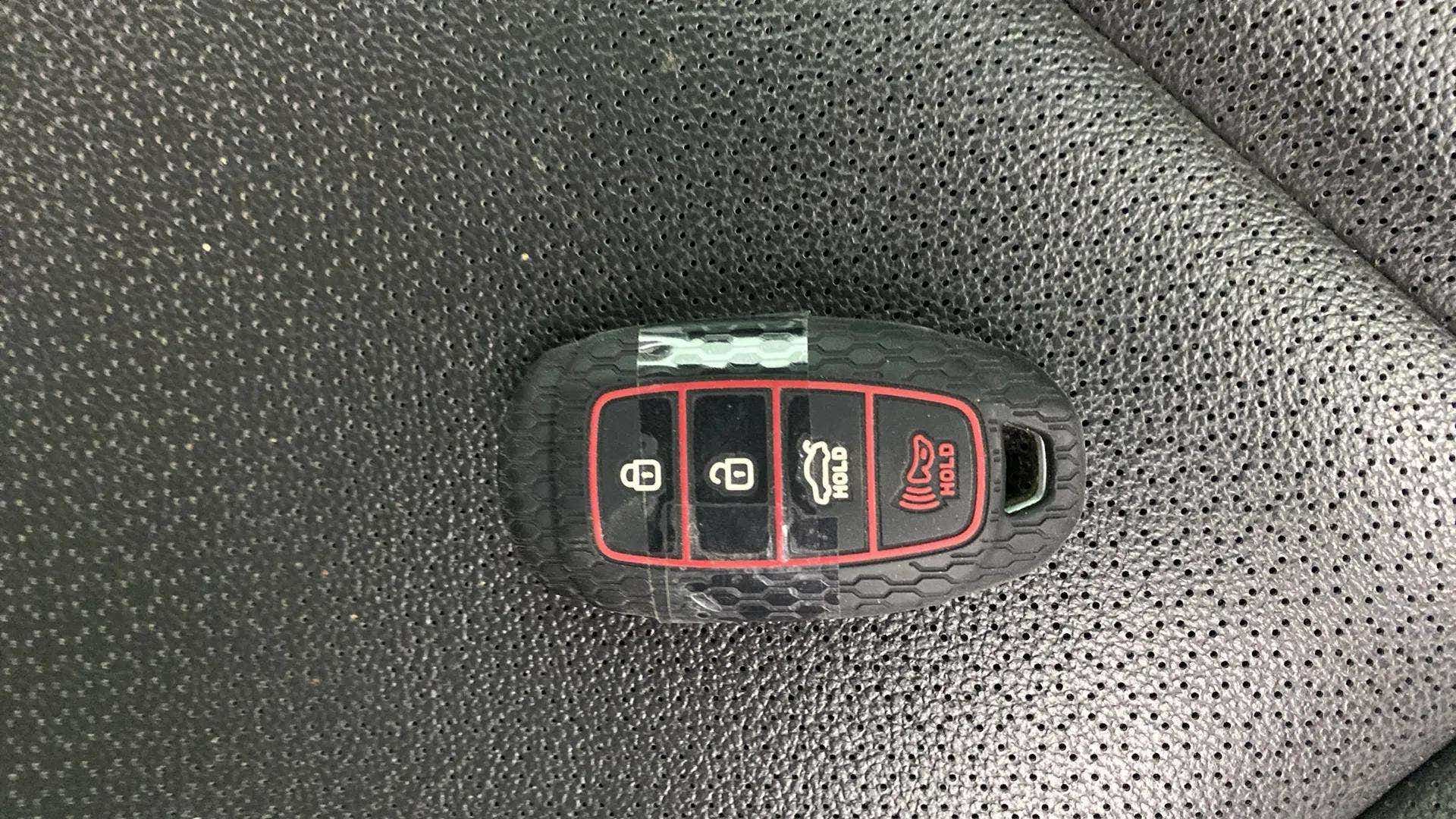 Car key fob on a seat of a Hyundai Verna