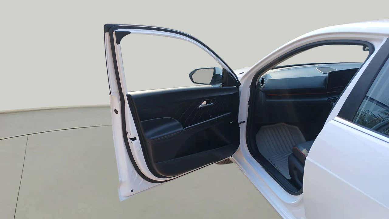 Front door and dashboard view of a Hyundai Verna