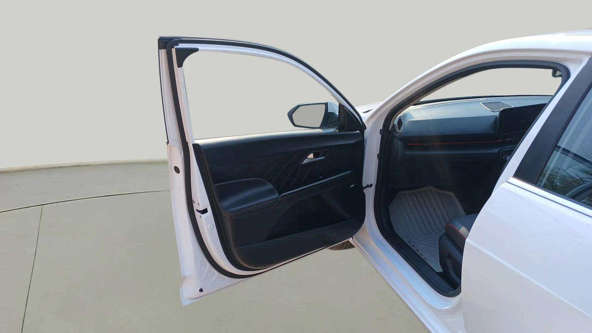 Front door and dashboard view of a Hyundai Verna
