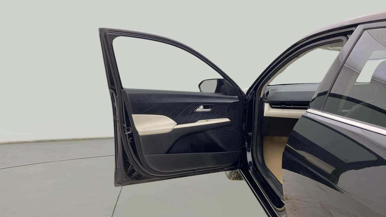 Front driver side door open view of a Hyundai Verna